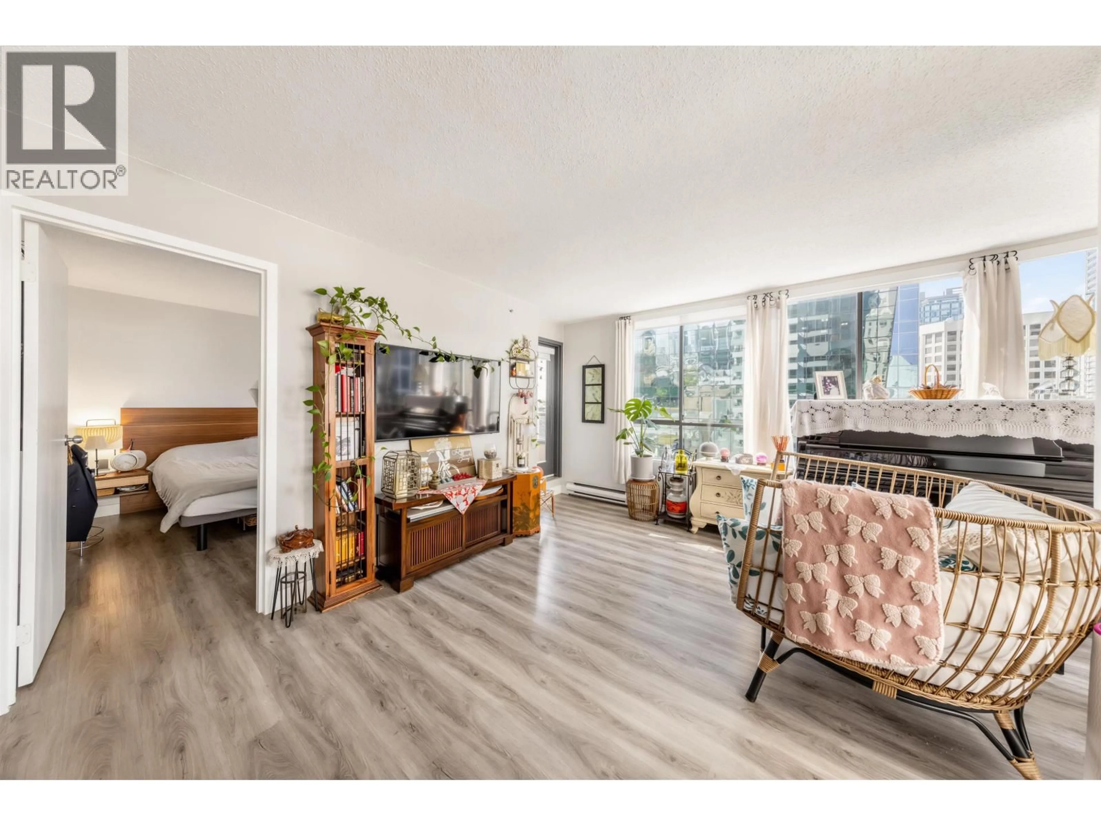 Living room with furniture, wood/laminate floor for 1506 - 1060 ALBERNI STREET, Vancouver British Columbia V6E4K2