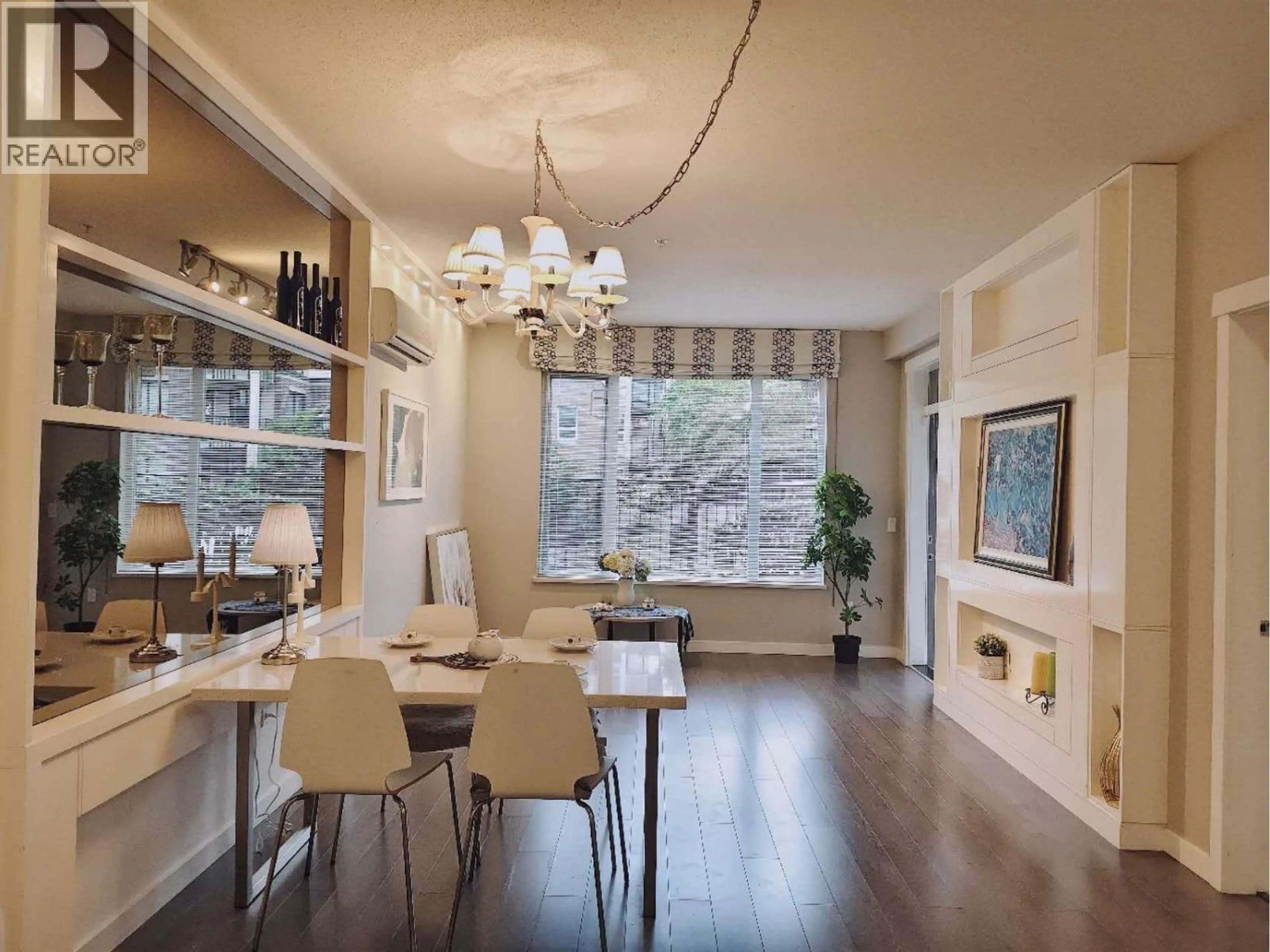 Dining room, wood/laminate floor for 105 - 9399 ODLIN ROAD, Richmond British Columbia V6X0J6