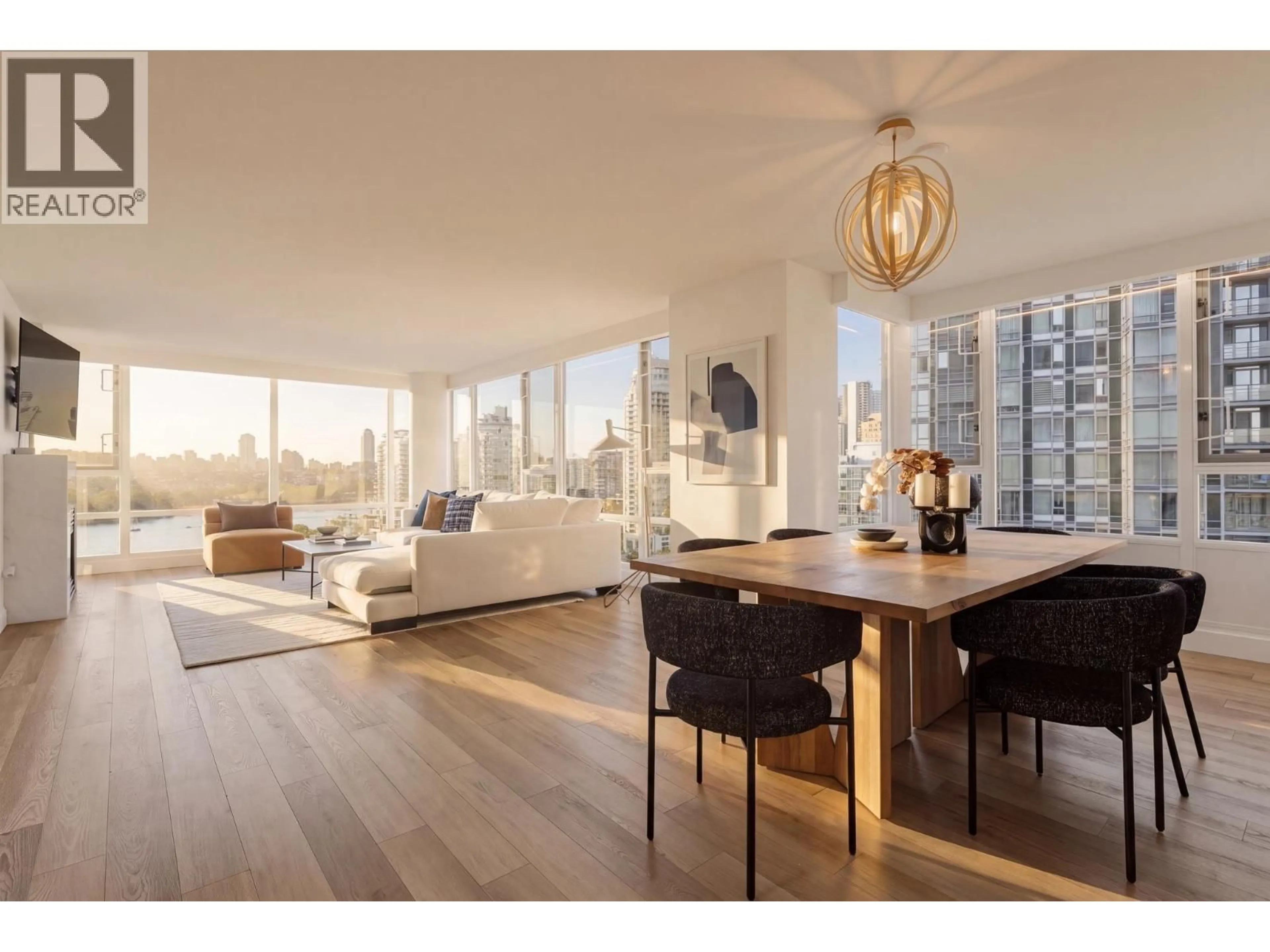 Living room with furniture, wood/laminate floor for 1707 - 1033 MARINASIDE CRESCENT, Vancouver British Columbia V6Z3A3