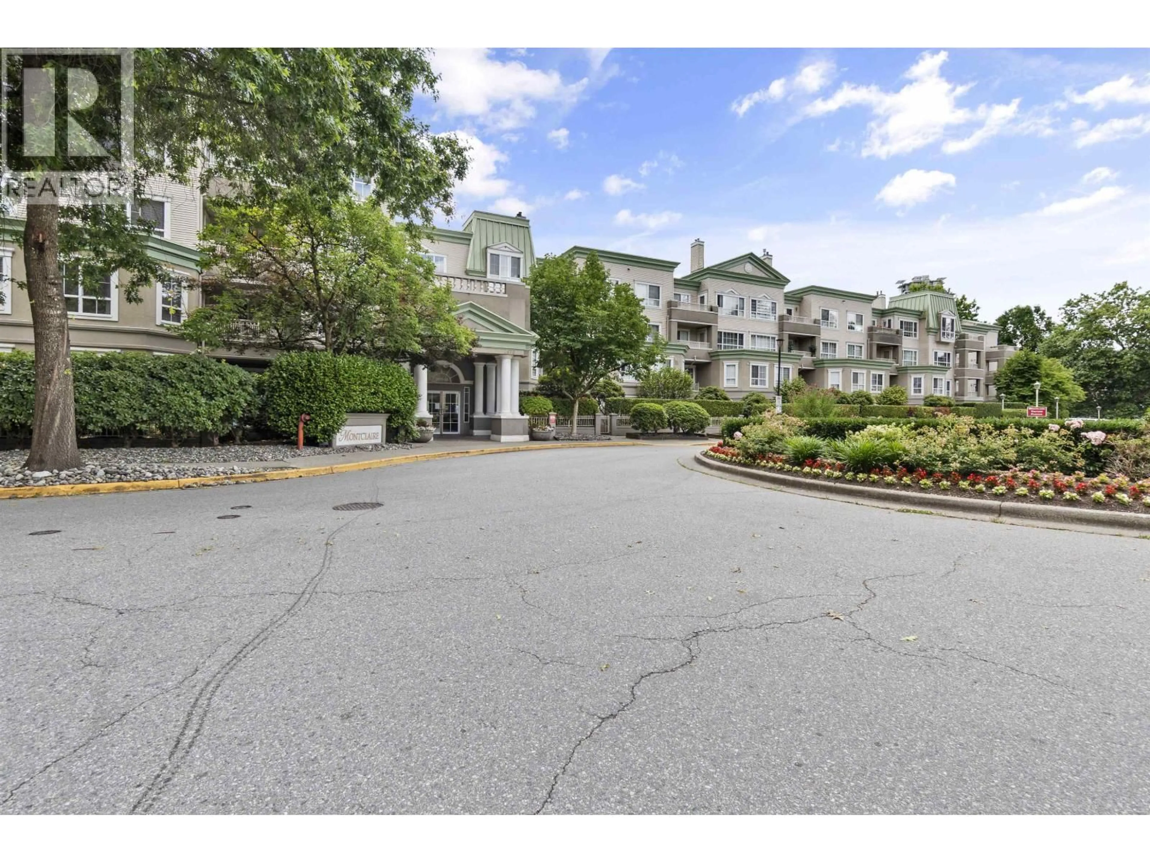 A pic from outside/outdoor area/front of a property/back of a property/a pic from drone, mountain view for 112 - 2970 PRINCESS CRESCENT, Coquitlam British Columbia V3B7R5