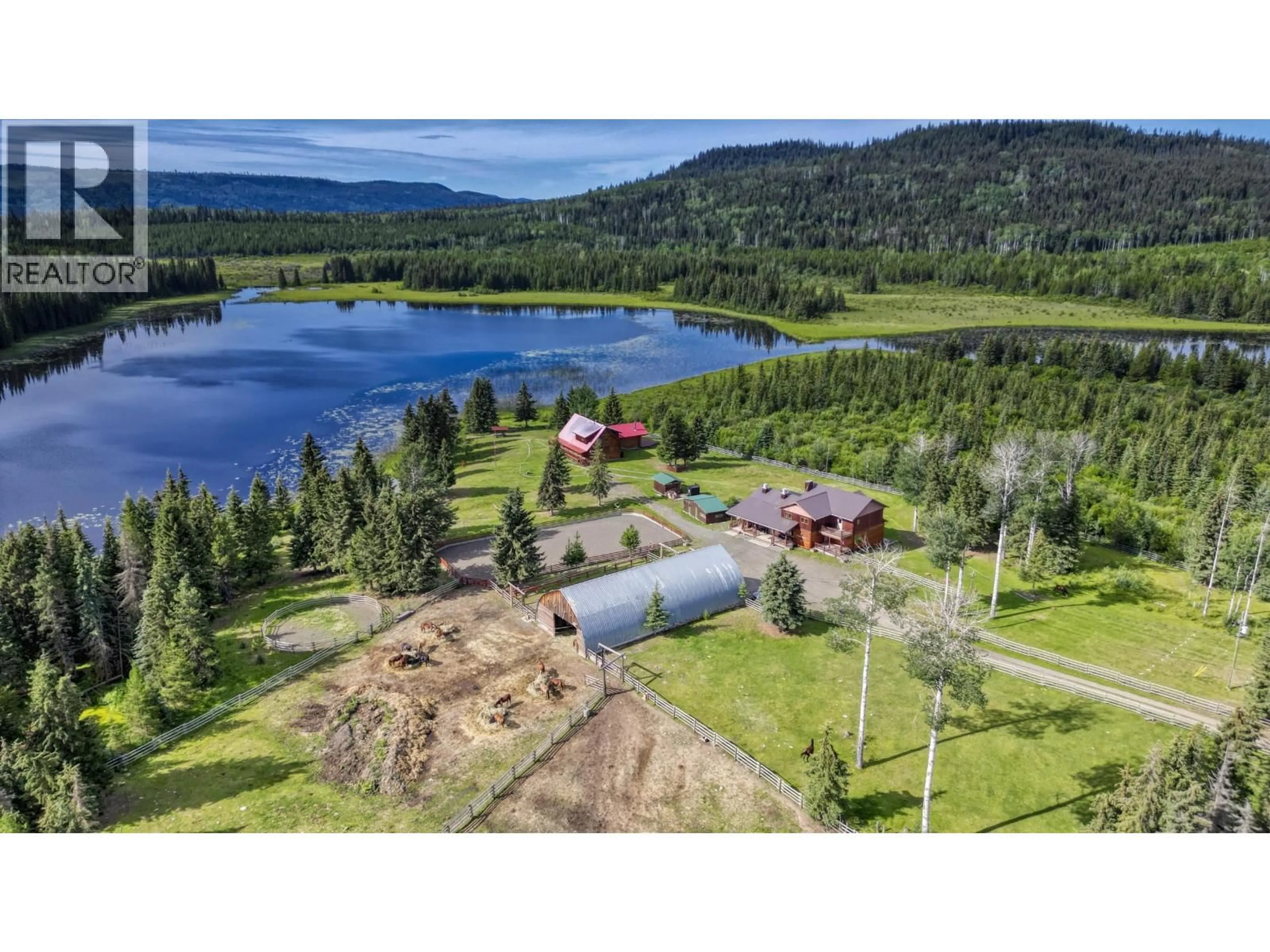 A pic from outside/outdoor area/front of a property/back of a property/a pic from drone, water/lake/river/ocean view for 9550 EAGAN LAKE ROAD, Bridge Lake British Columbia V0K1E0