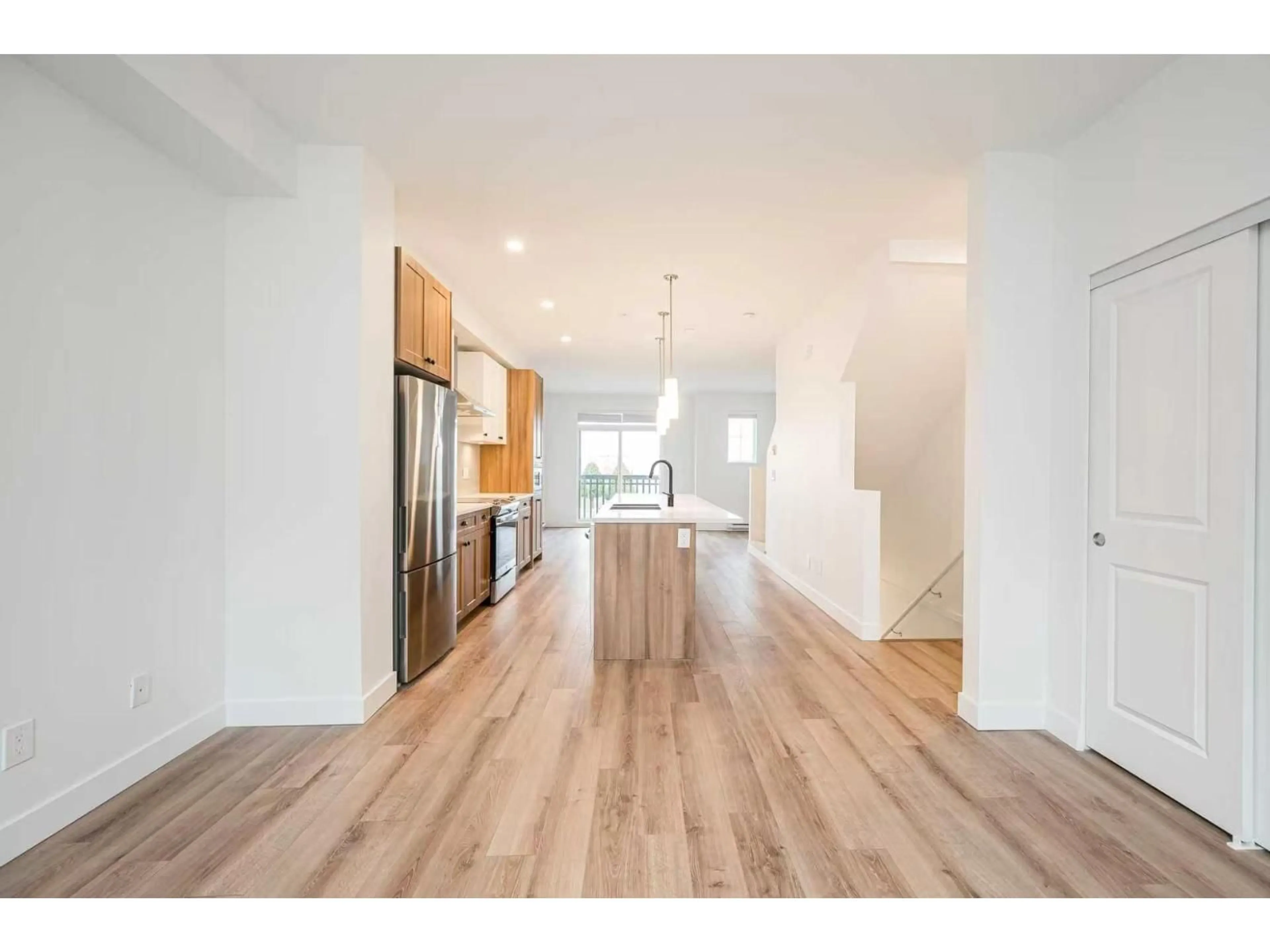 Open concept kitchen, wood/laminate floor for 2 - 20487 65 AVENUE, Langley British Columbia V2Y3K8