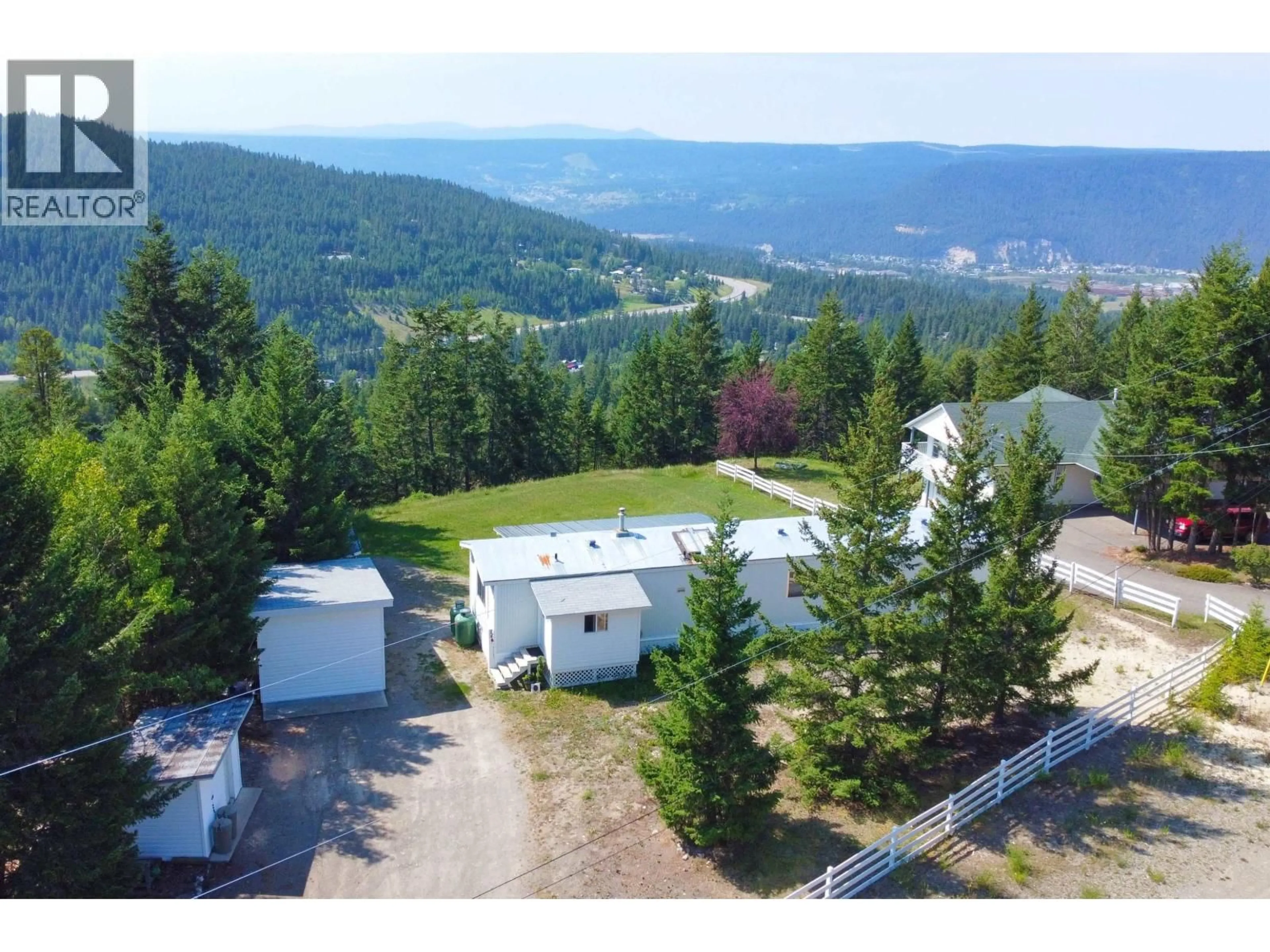 A pic from outside/outdoor area/front of a property/back of a property/a pic from drone, mountain view for 1999 ABLITT ROAD, Williams Lake British Columbia V2G5C7