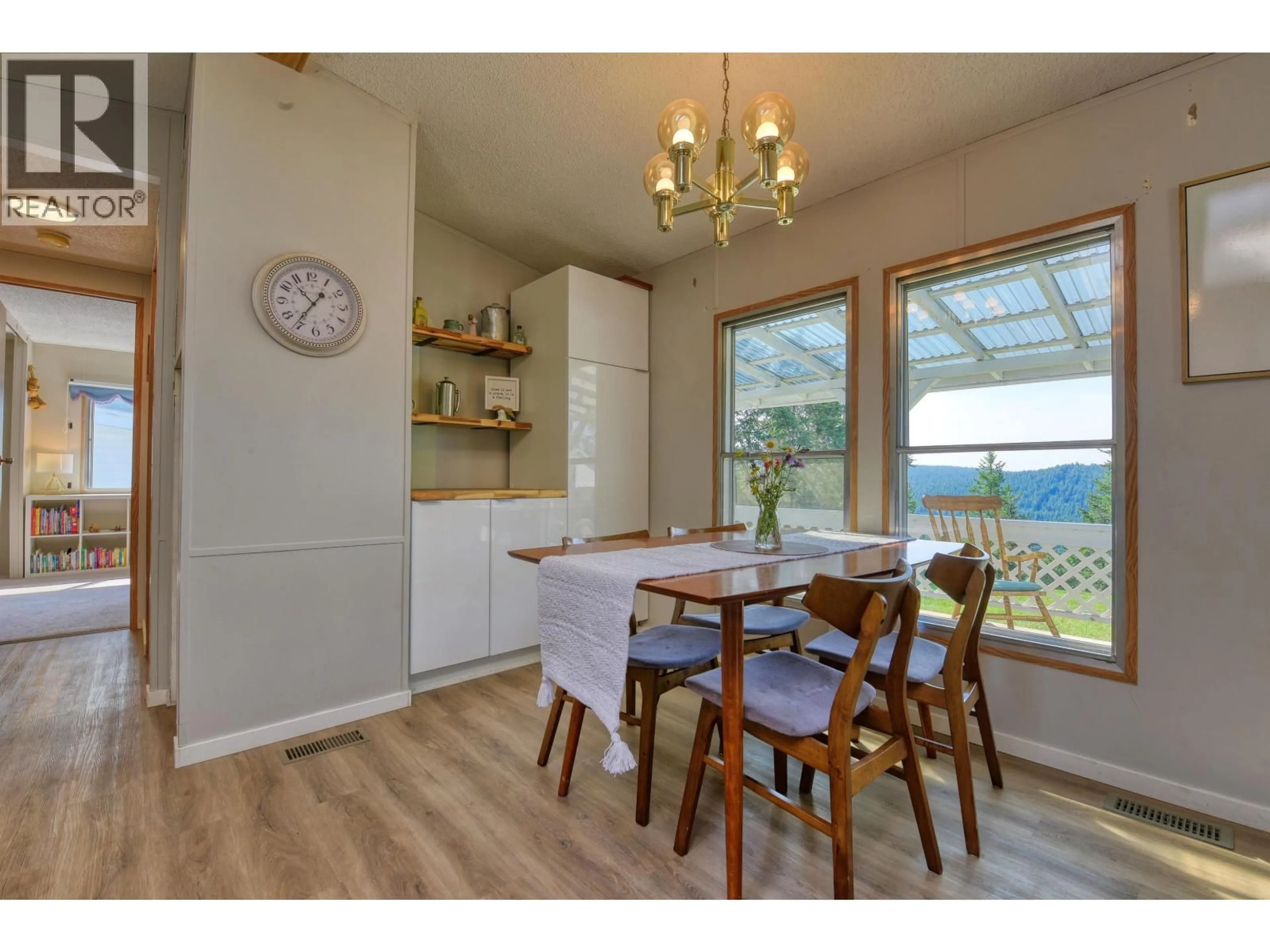 Dining room, wood/laminate floor for 1999 ABLITT ROAD, Williams Lake British Columbia V2G5C7