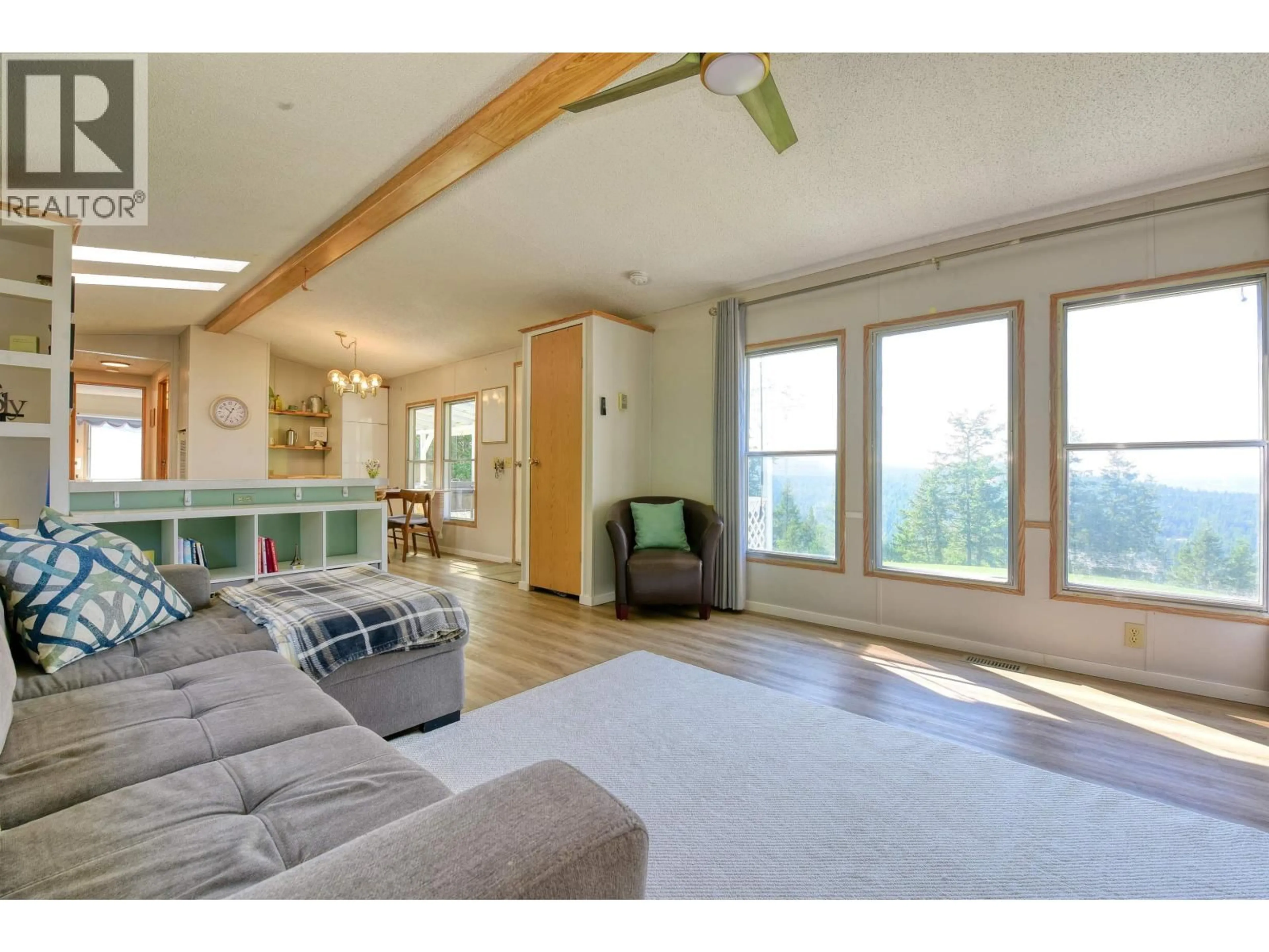 Living room with furniture, wood/laminate floor for 1999 ABLITT ROAD, Williams Lake British Columbia V2G5C7