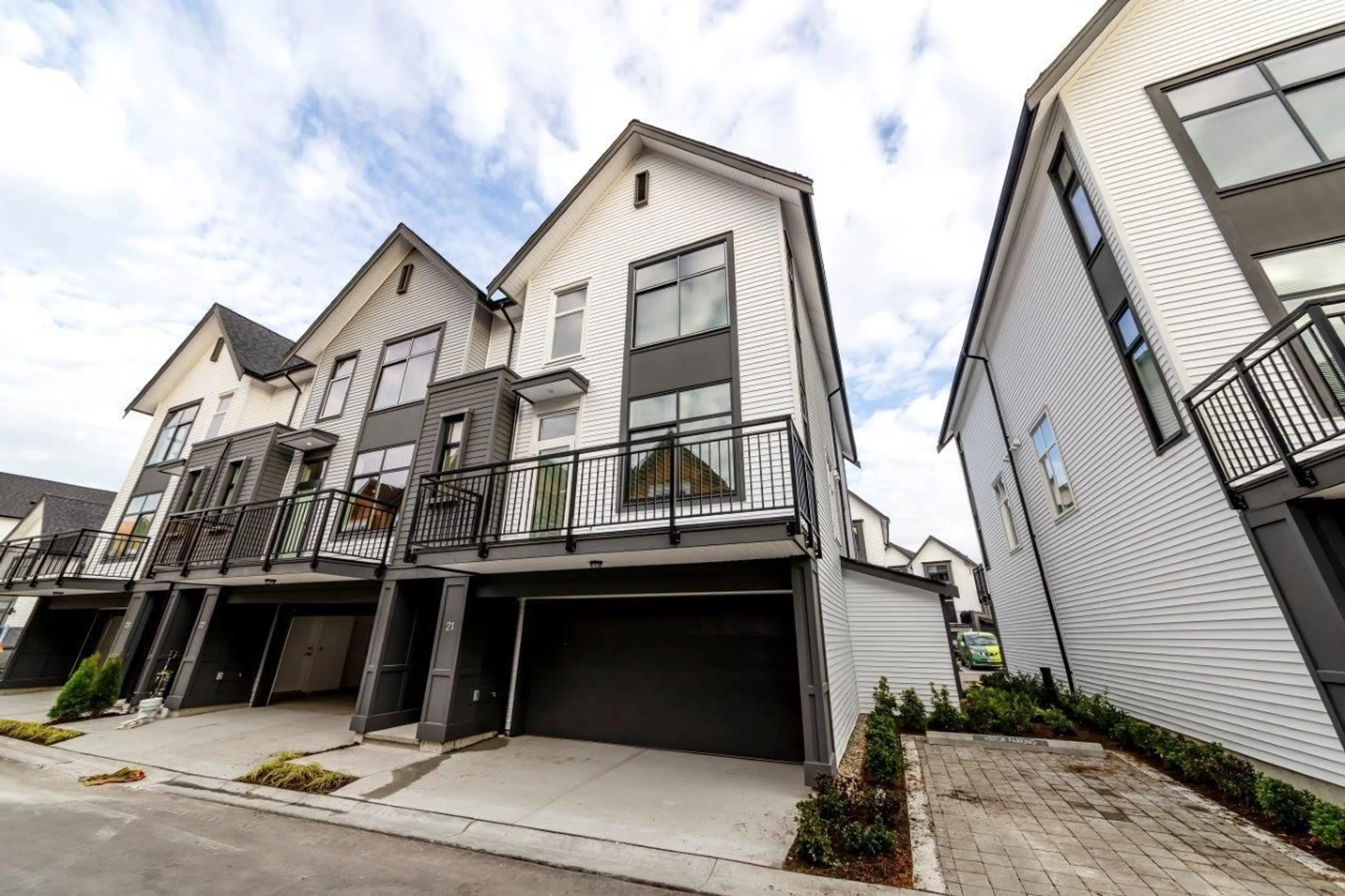 A pic from outside/outdoor area/front of a property/back of a property/a pic from drone, street for 21 - 17555 57A AVENUE, Surrey British Columbia V3S7V2
