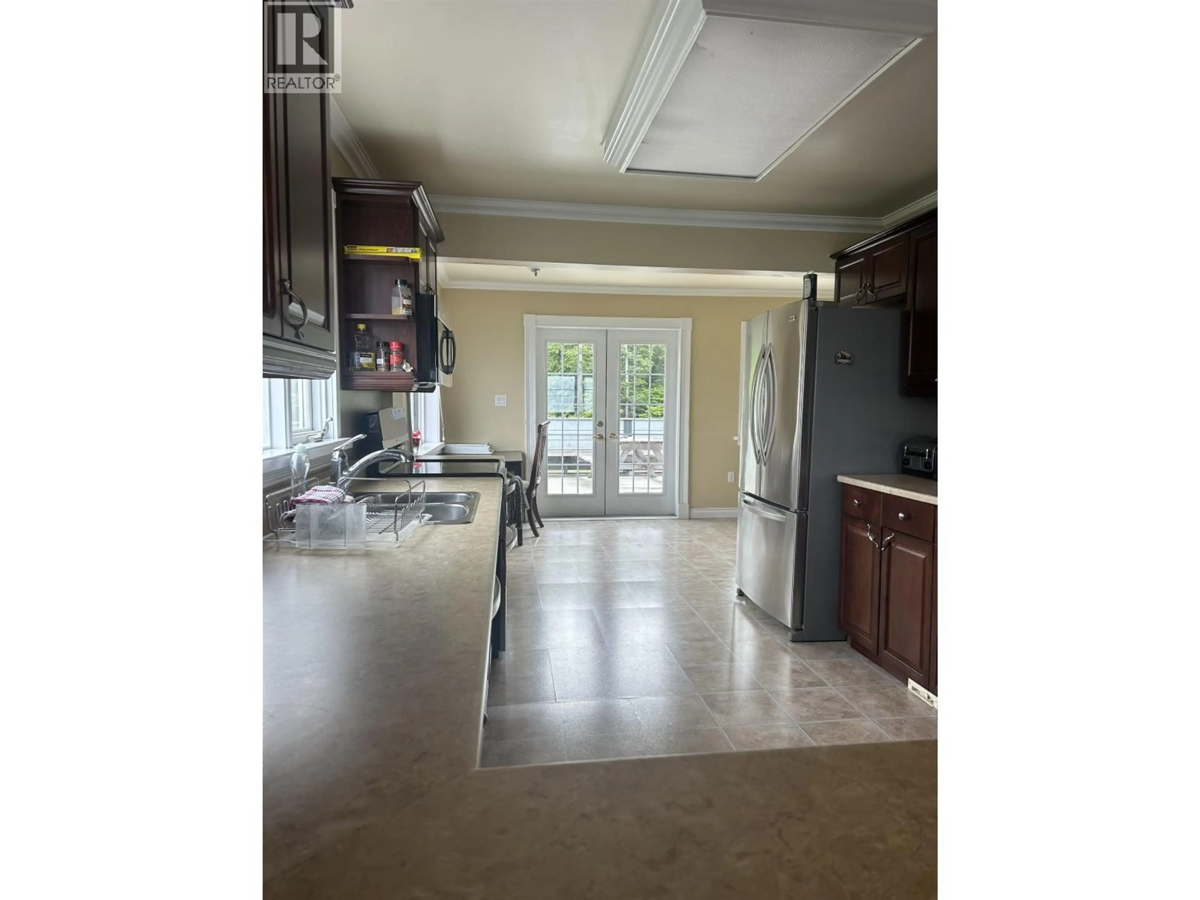 Open concept kitchen, ceramic/tile floor for 525 BEACH ROAD, Skidegate/Sandspit British Columbia V0T1T0