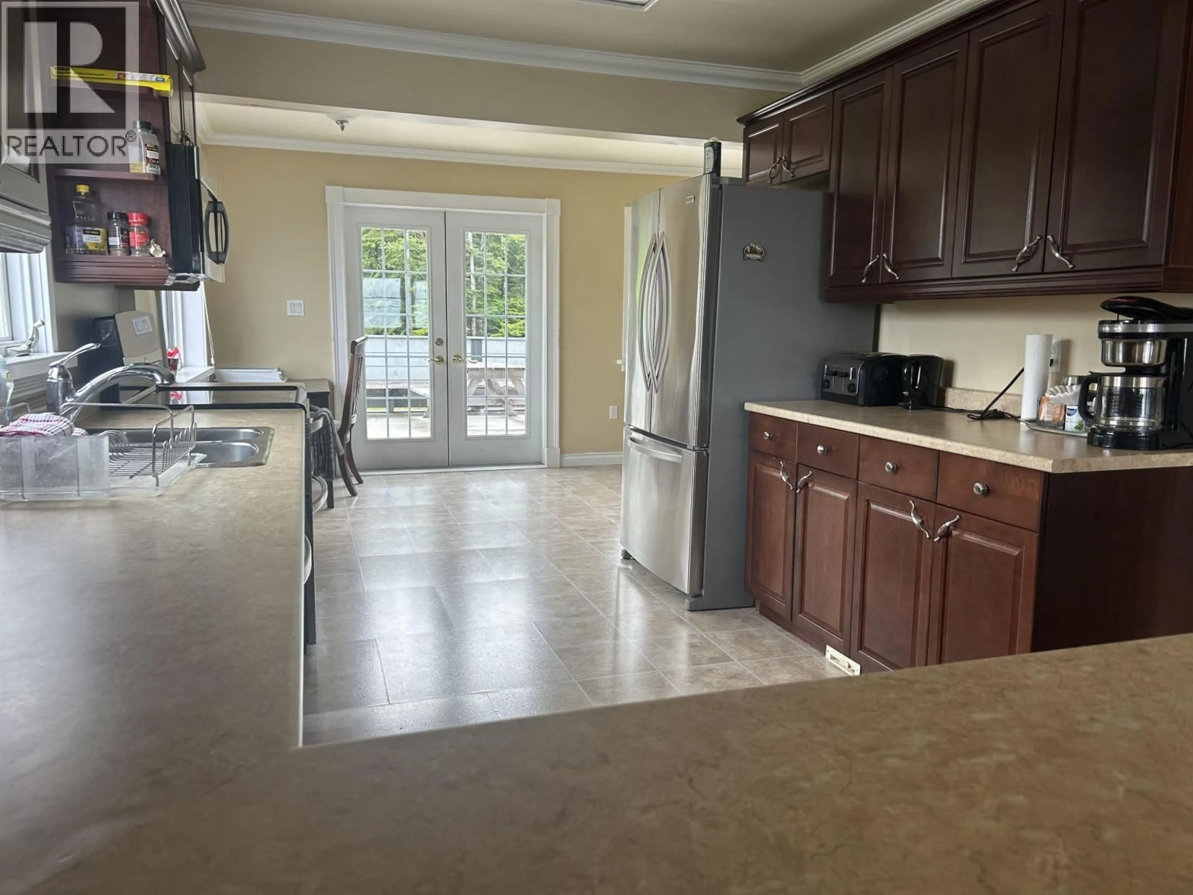 Open concept kitchen, unknown for 525 BEACH ROAD, Skidegate/Sandspit British Columbia V0T1T0