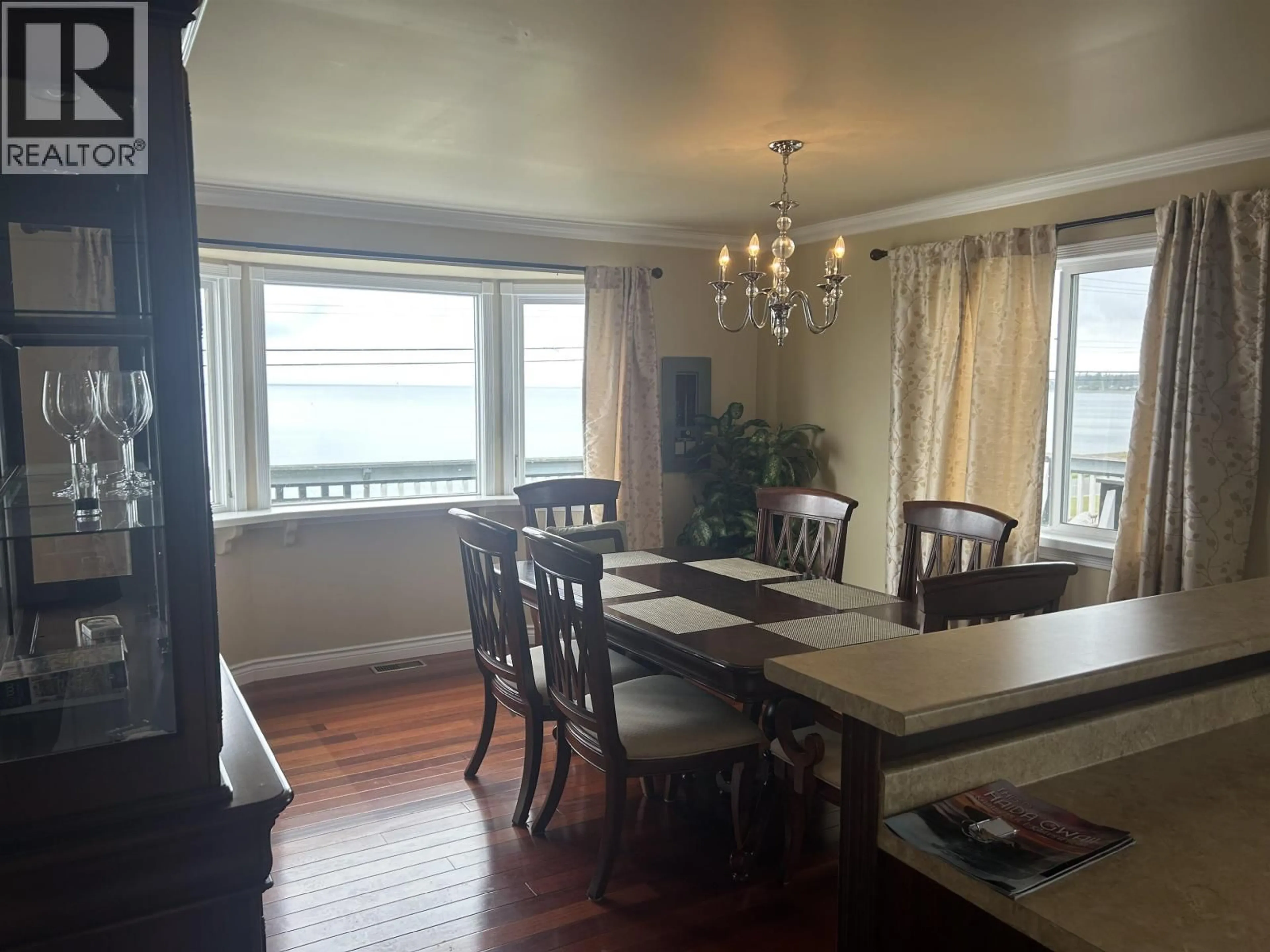 Dining room, wood/laminate floor for 525 BEACH ROAD, Skidegate/Sandspit British Columbia V0T1T0