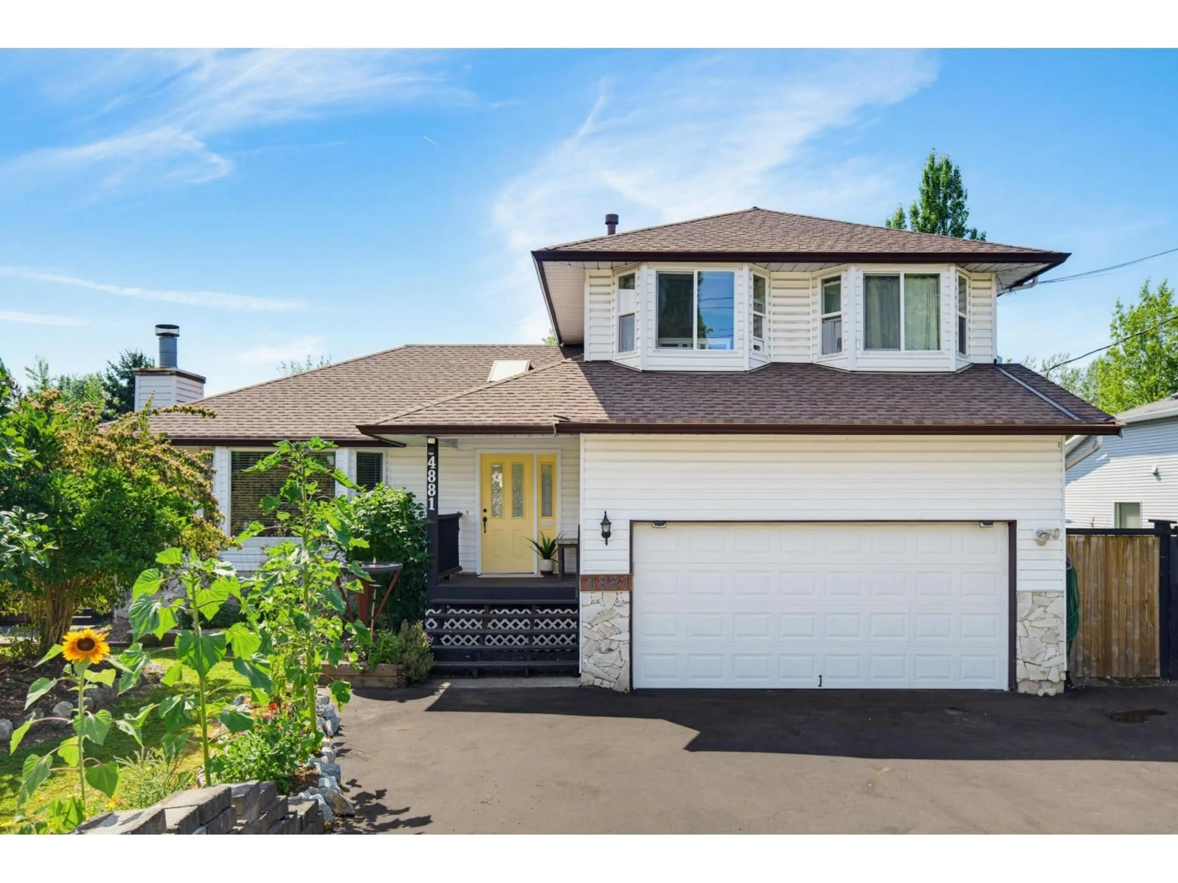 Home with vinyl exterior material, street for 4881 216 STREET, Langley British Columbia V3A2M8