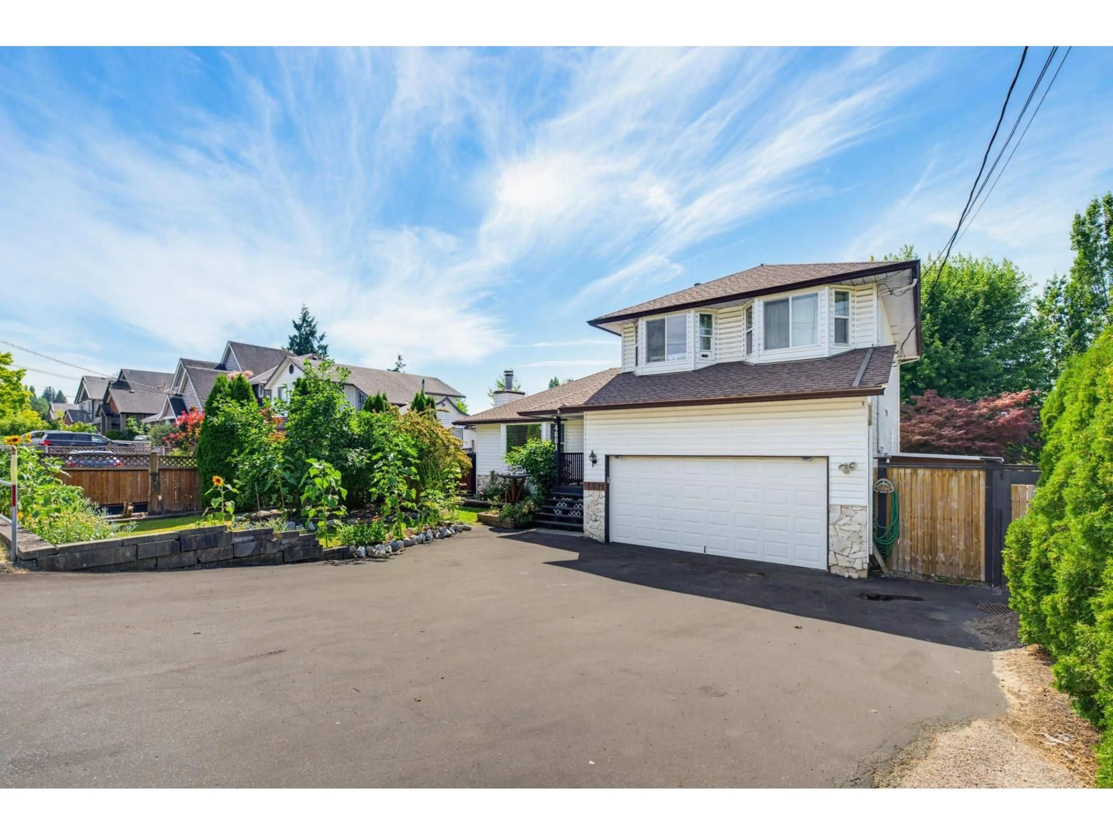A pic from outside/outdoor area/front of a property/back of a property/a pic from drone, street for 4881 216 STREET, Langley British Columbia V3A2M8