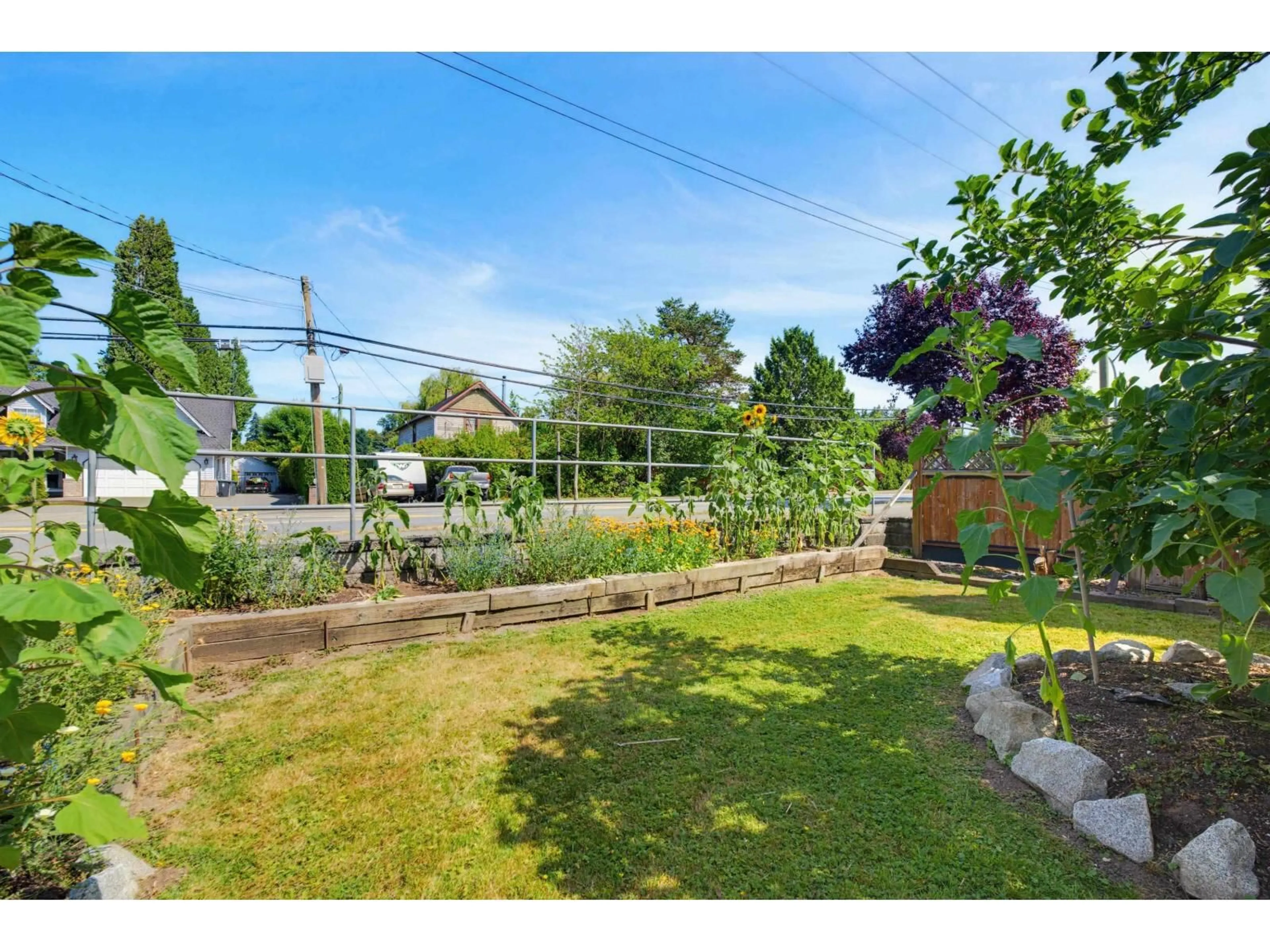 A pic from outside/outdoor area/front of a property/back of a property/a pic from drone, street for 4881 216 STREET, Langley British Columbia V3A2M8