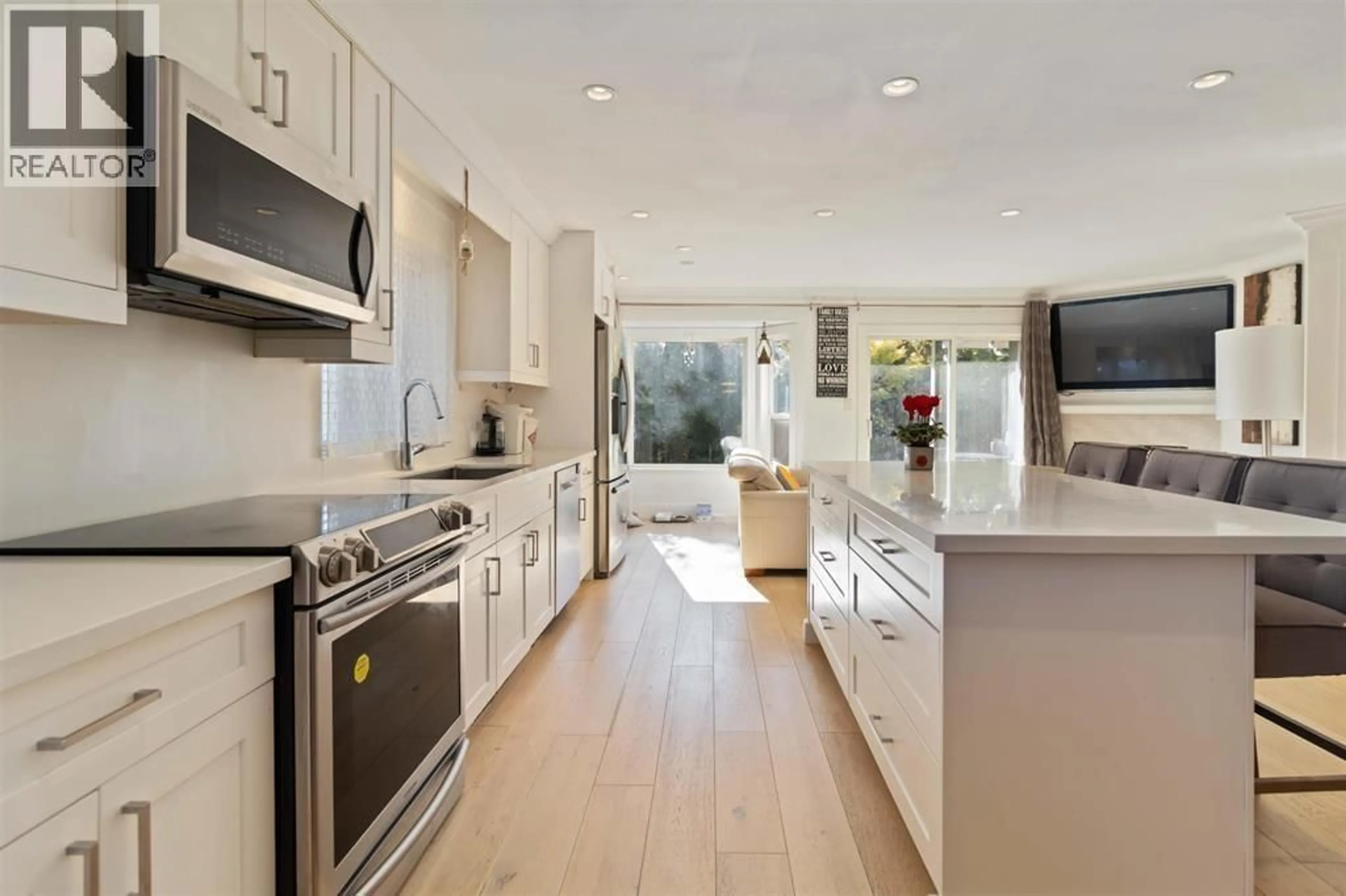 Open concept kitchen, ceramic/tile floor for 4881 63A STREET, Delta British Columbia V4K5A1