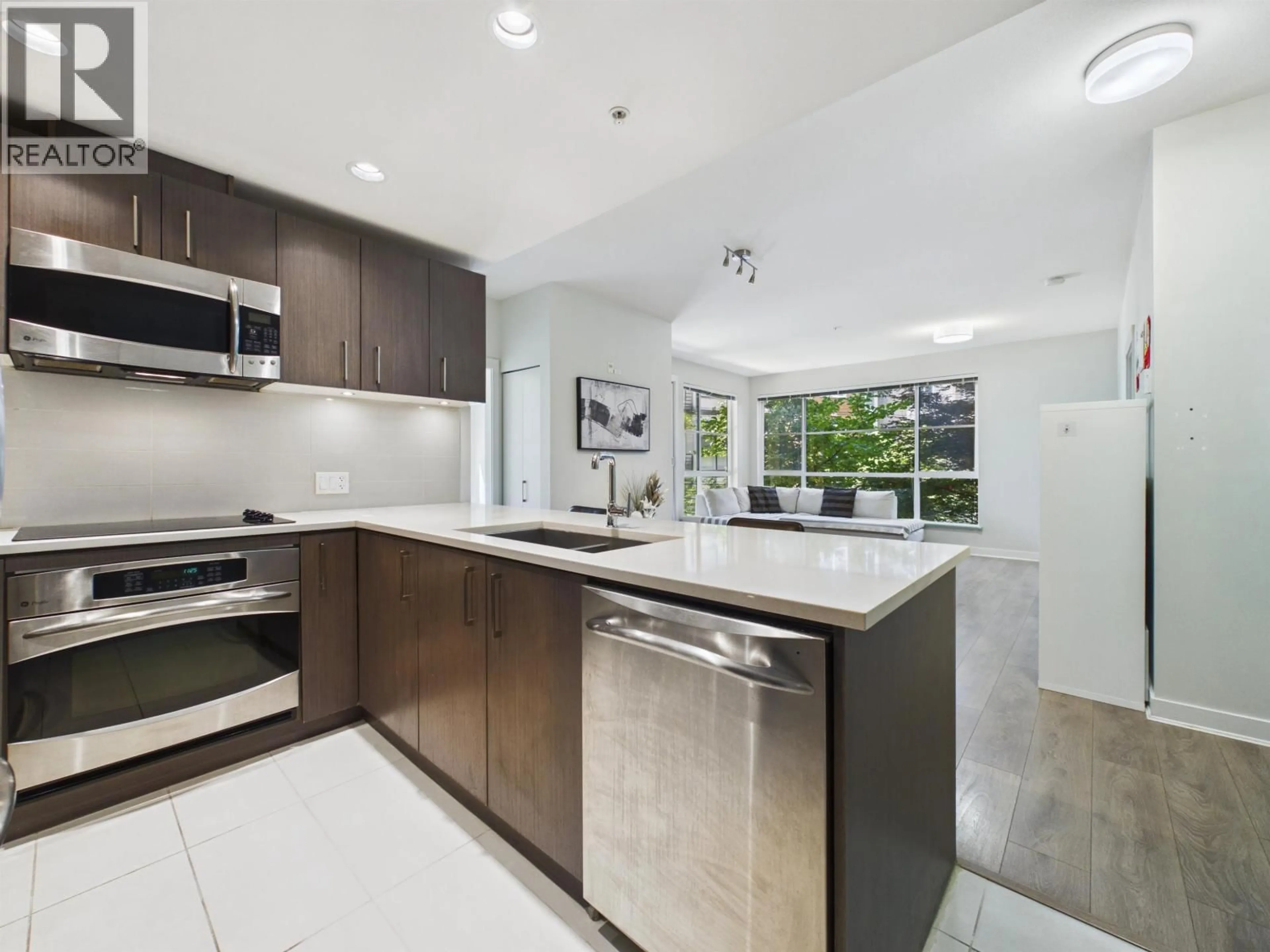 Open concept kitchen, ceramic/tile floor for 213 - 5983 GRAY AVENUE, Vancouver British Columbia V6S0G8