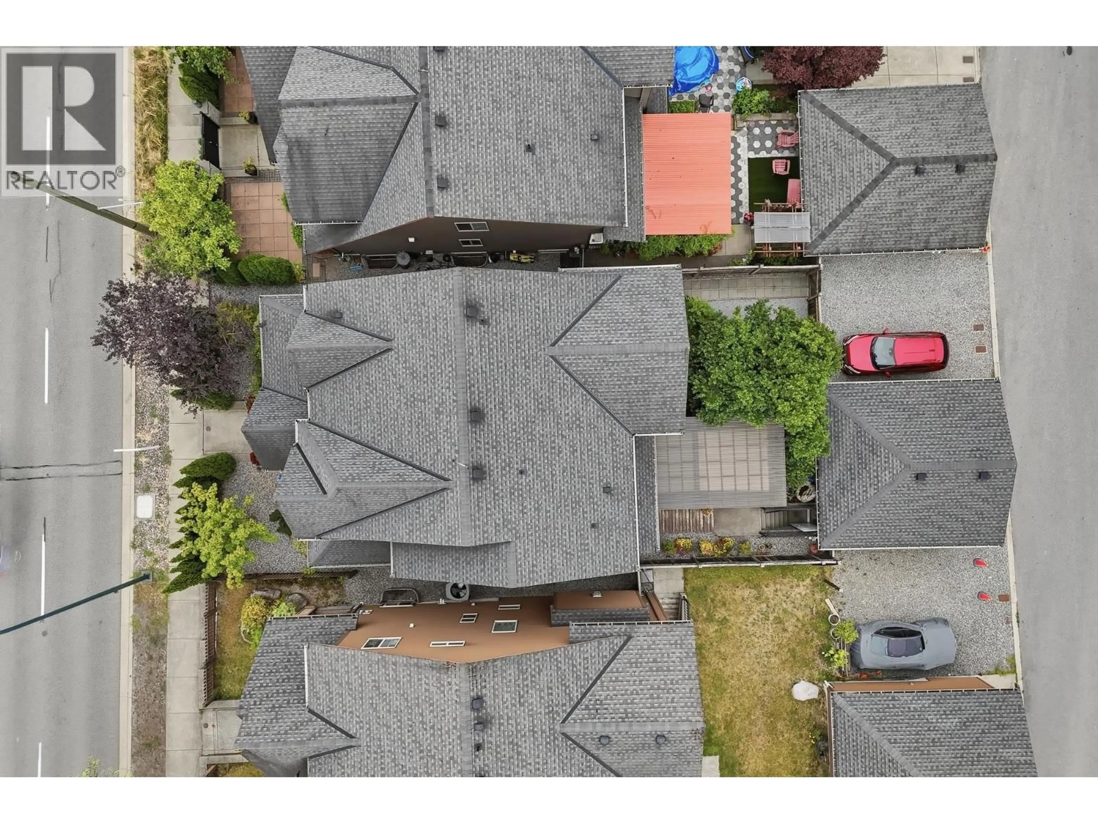 A pic from outside/outdoor area/front of a property/back of a property/a pic from drone, street for 1386 COAST MERIDIAN ROAD, Coquitlam British Columbia V3E3H1
