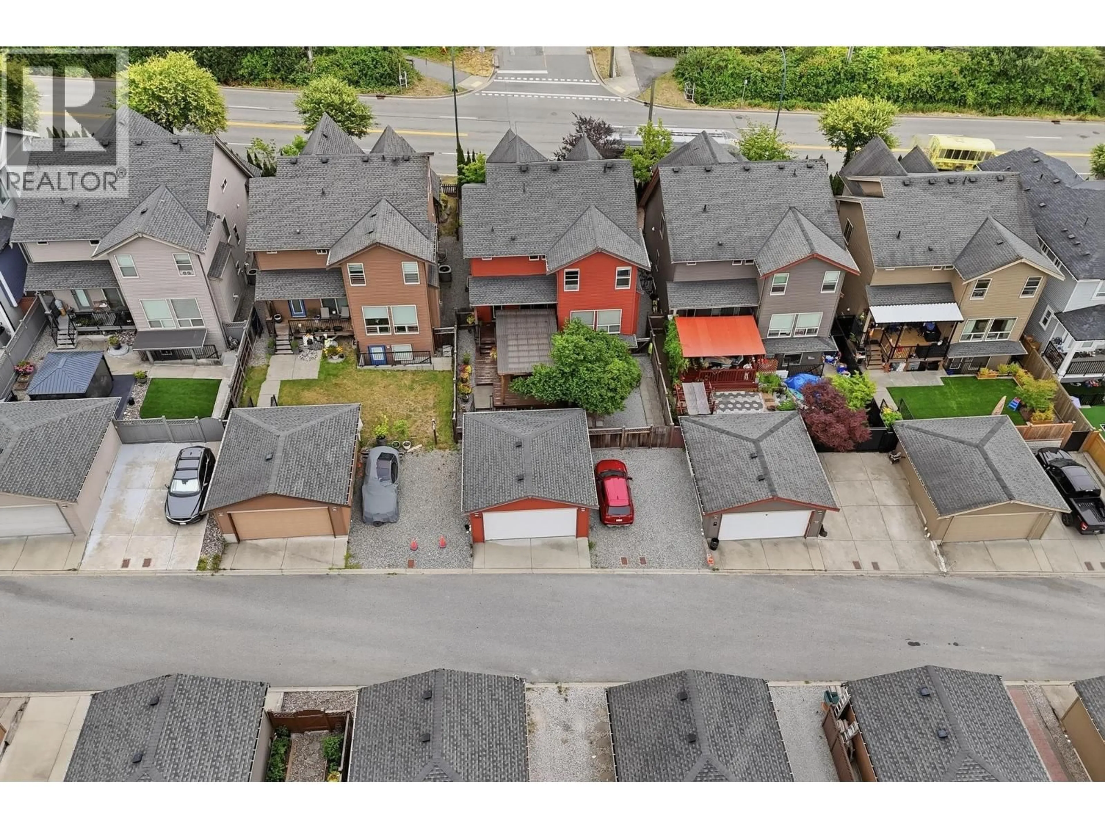 A pic from outside/outdoor area/front of a property/back of a property/a pic from drone, street for 1386 COAST MERIDIAN ROAD, Coquitlam British Columbia V3E3H1