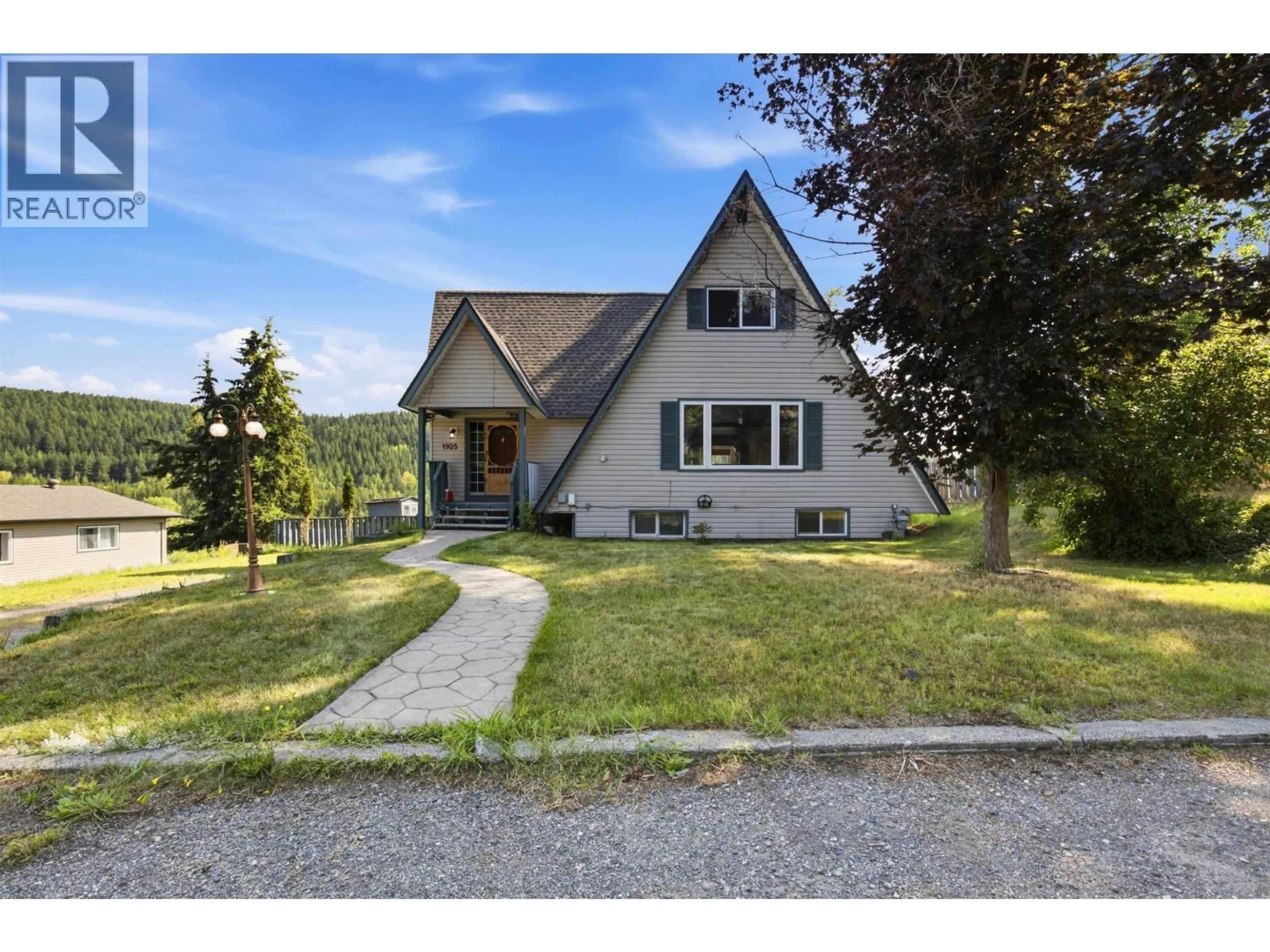 A pic from outside/outdoor area/front of a property/back of a property/a pic from drone, mountain view for 1925 COMMODORE CRESCENT, Williams Lake British Columbia V2G5C9