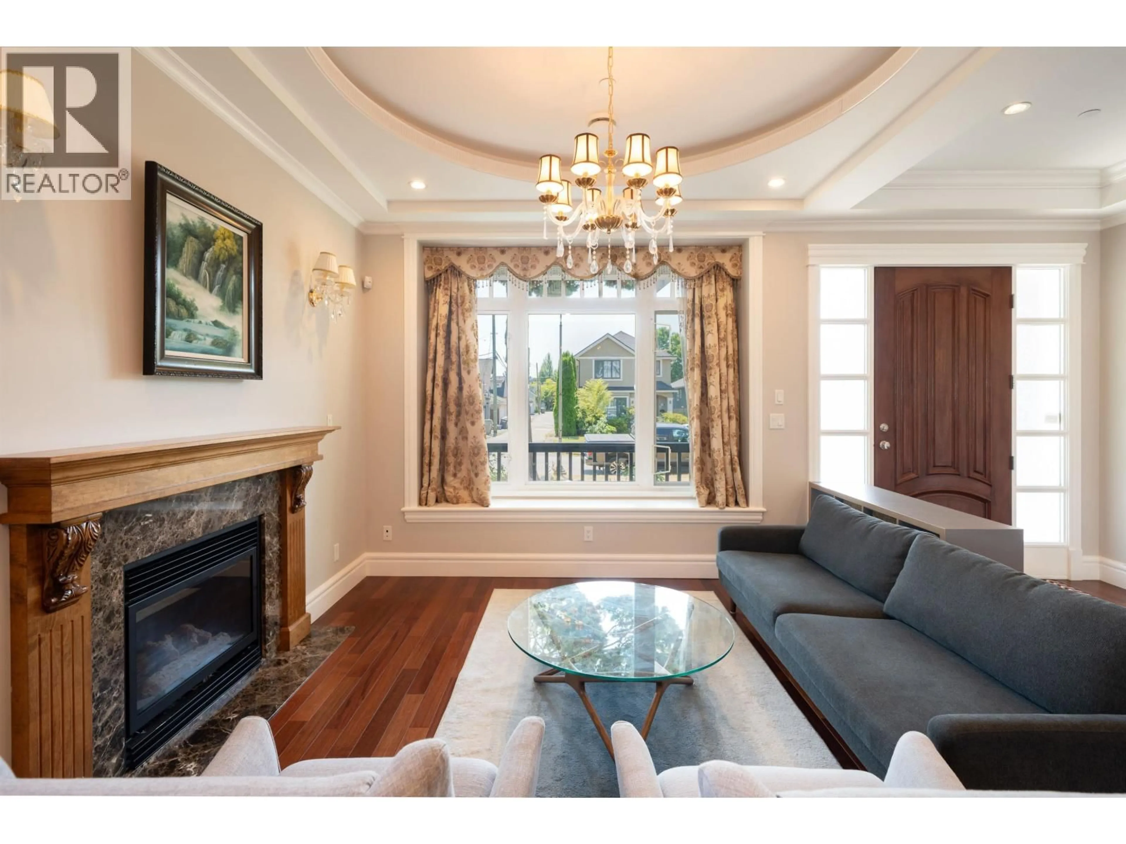 Living room with furniture, wood/laminate floor for 2715 20TH AVENUE, Vancouver British Columbia V6L1H1