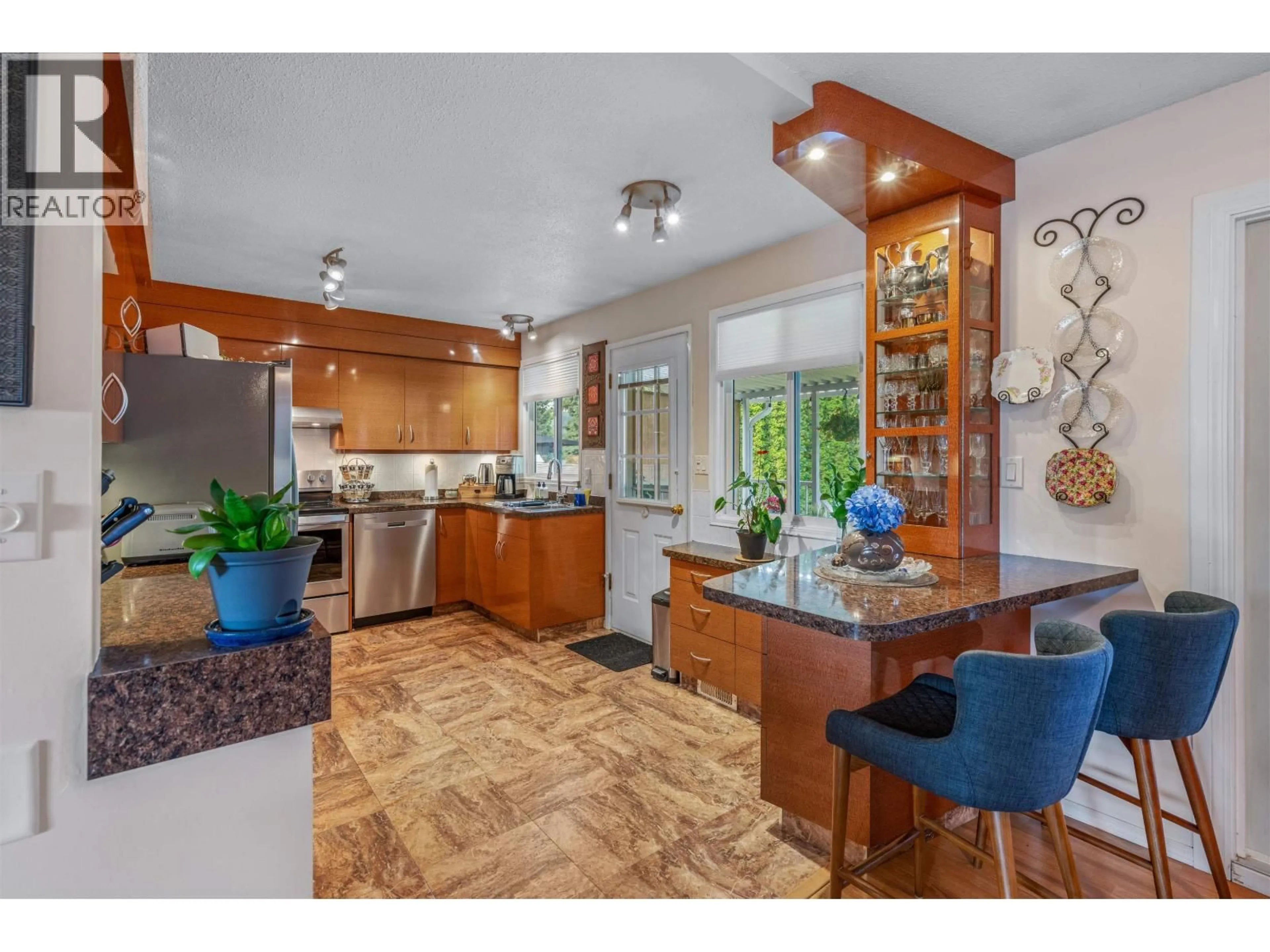 Open concept kitchen, ceramic/tile floor for 173 VOYAGEUR DRIVE, Prince George British Columbia V2M4P1