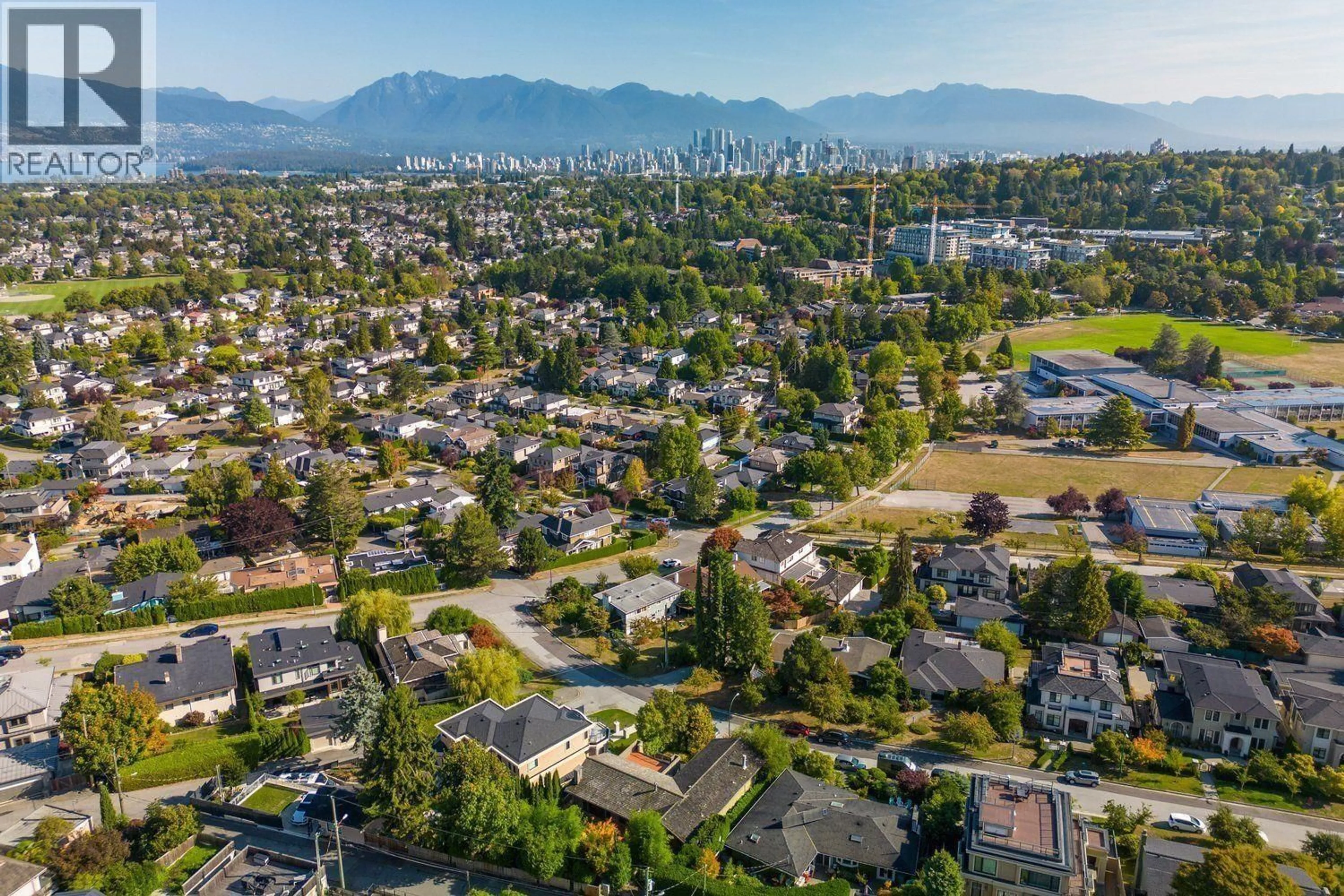 A pic from outside/outdoor area/front of a property/back of a property/a pic from drone, mountain view for 4729 PATON STREET, Vancouver British Columbia V6L2H9