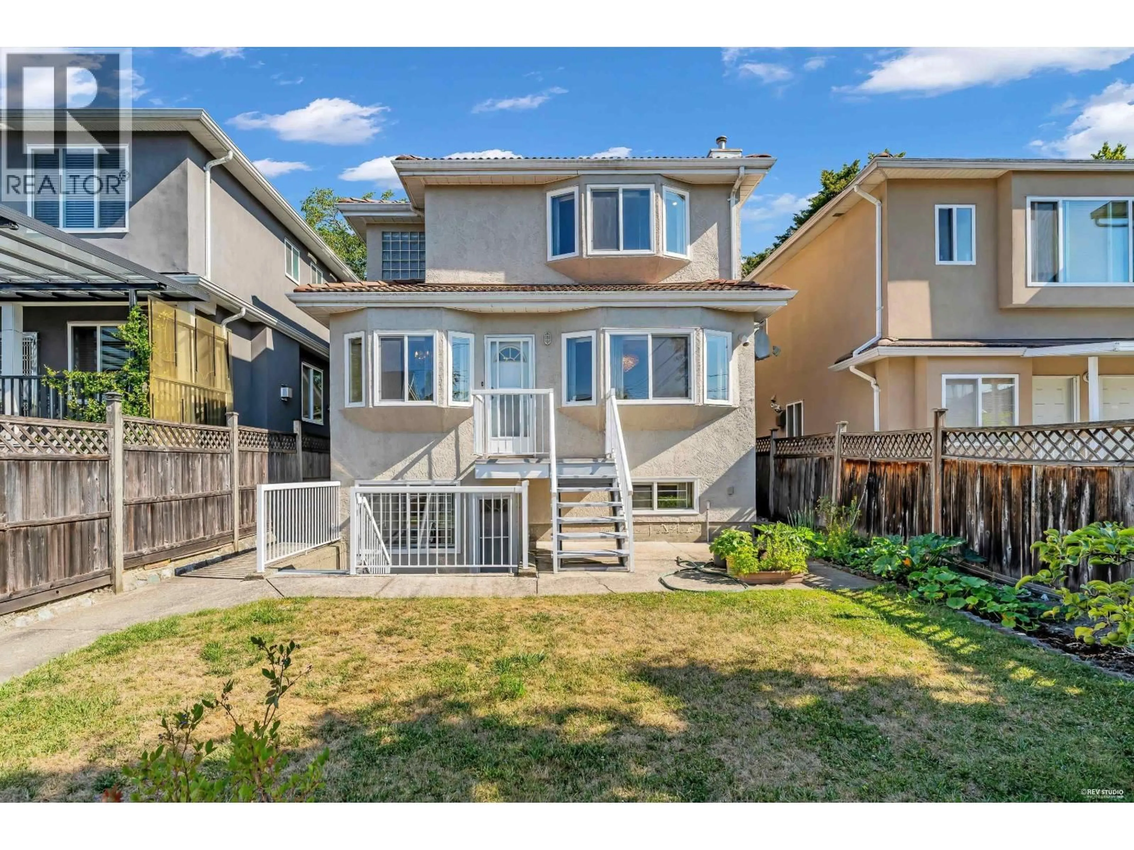A pic from outside/outdoor area/front of a property/back of a property/a pic from drone, street for 2866 44TH AVENUE, Vancouver British Columbia V5R3A6