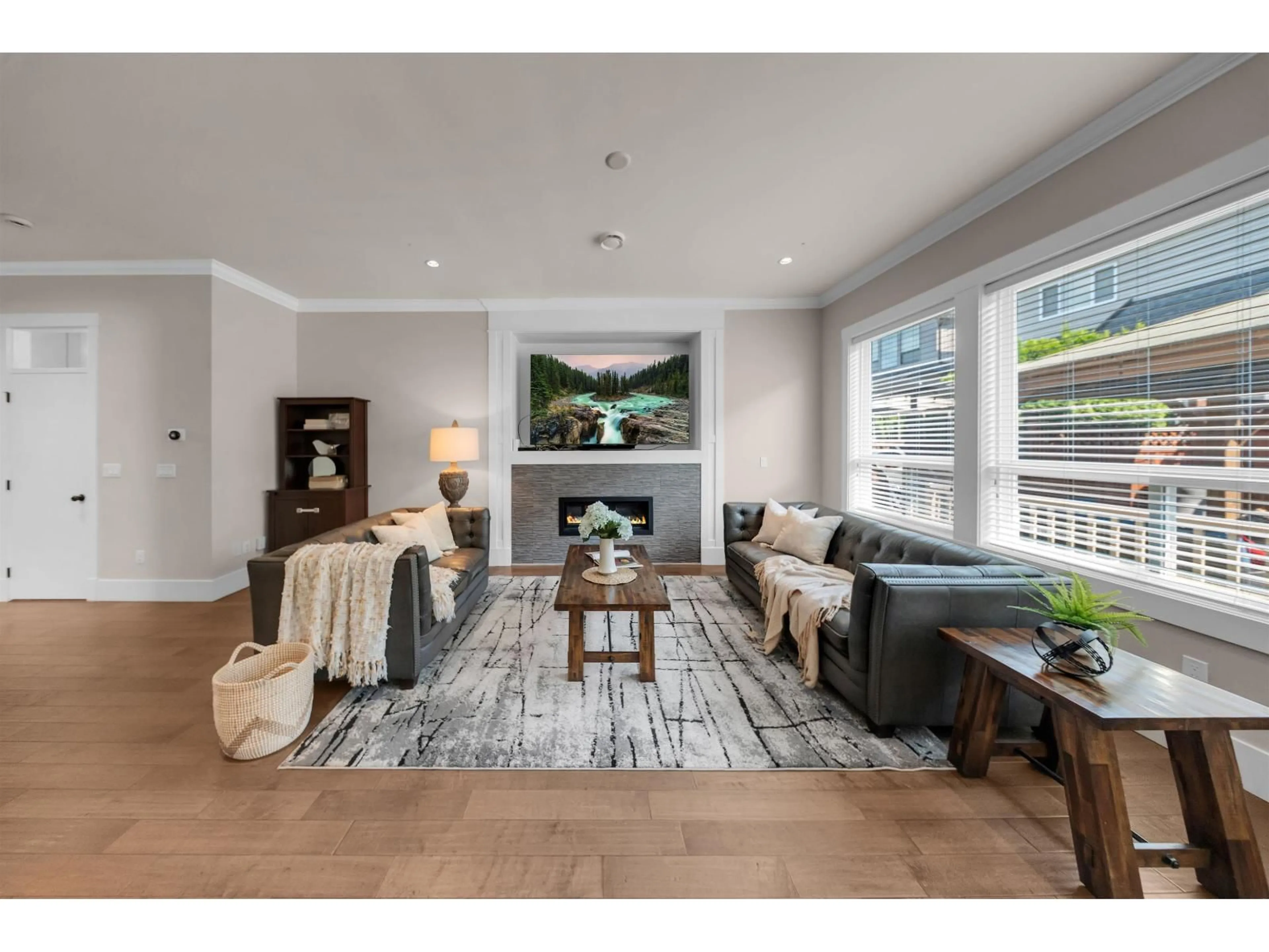 Living room with furniture, wood/laminate floor for 20966 80B AVENUE, Langley British Columbia V2Y0R2