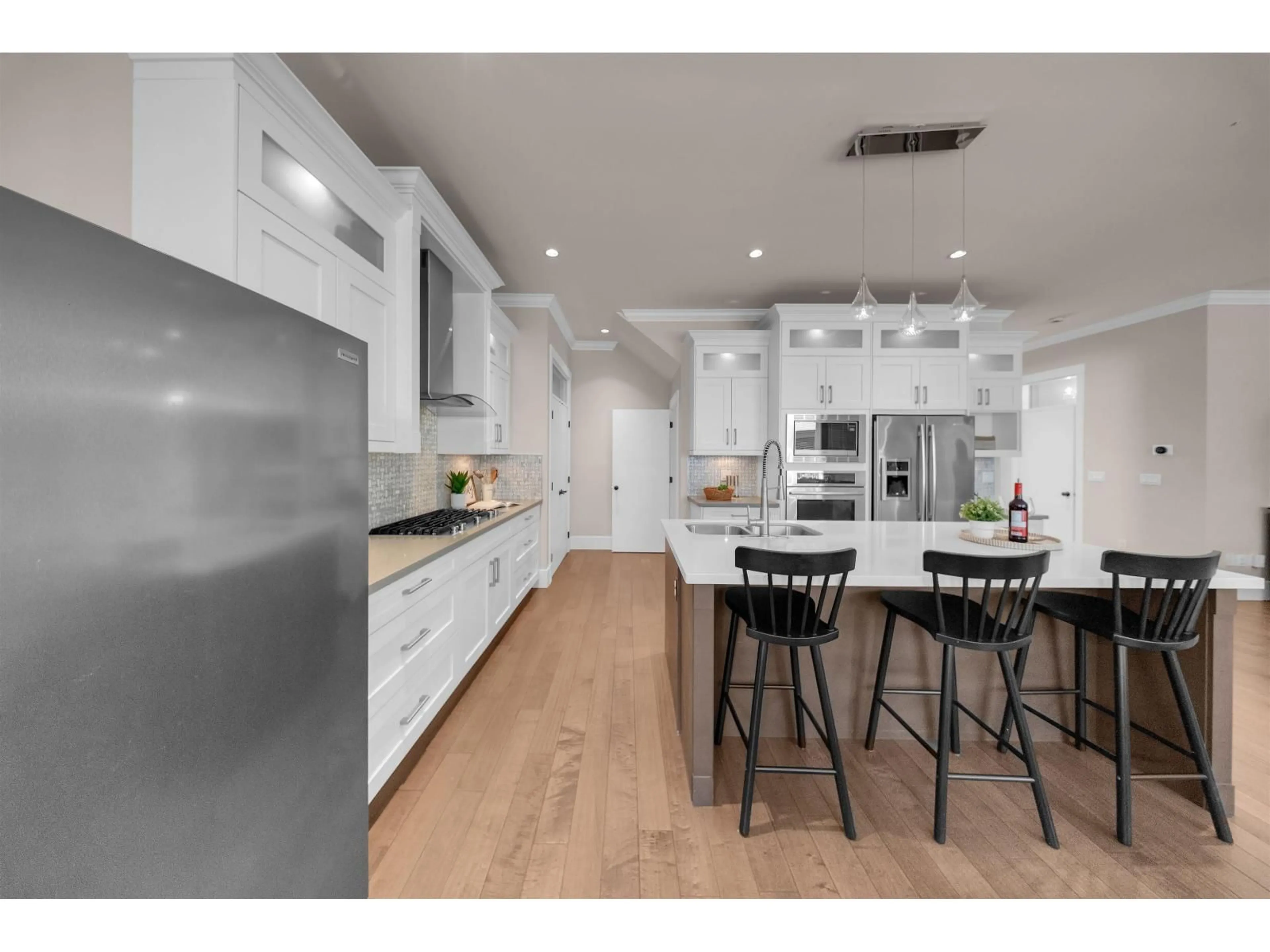 Contemporary kitchen, wood/laminate floor for 20966 80B AVENUE, Langley British Columbia V2Y0R2