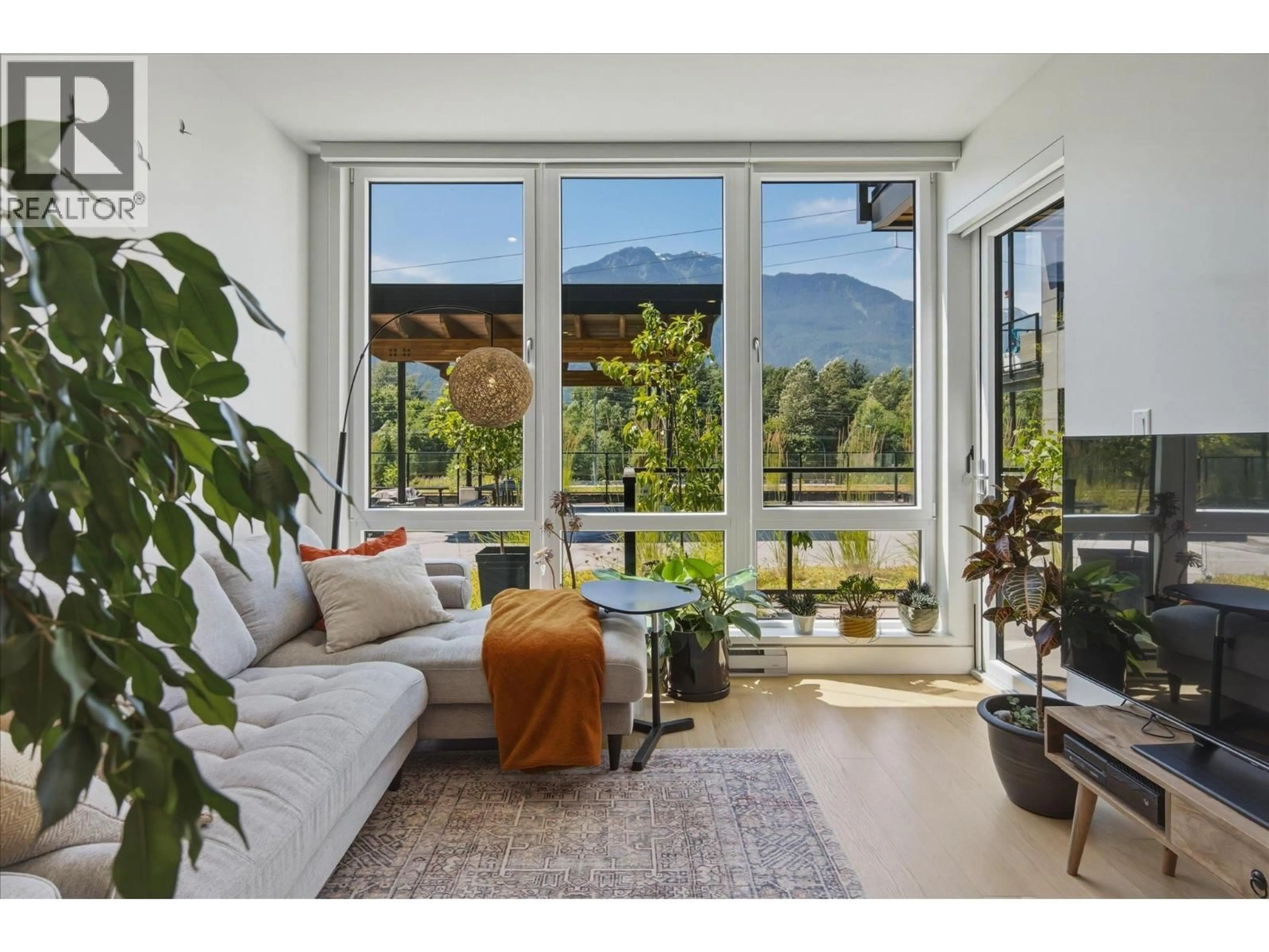 Living room with furniture, unknown for 213 - 1870 DOWAD DRIVE, Squamish British Columbia V8B1C4