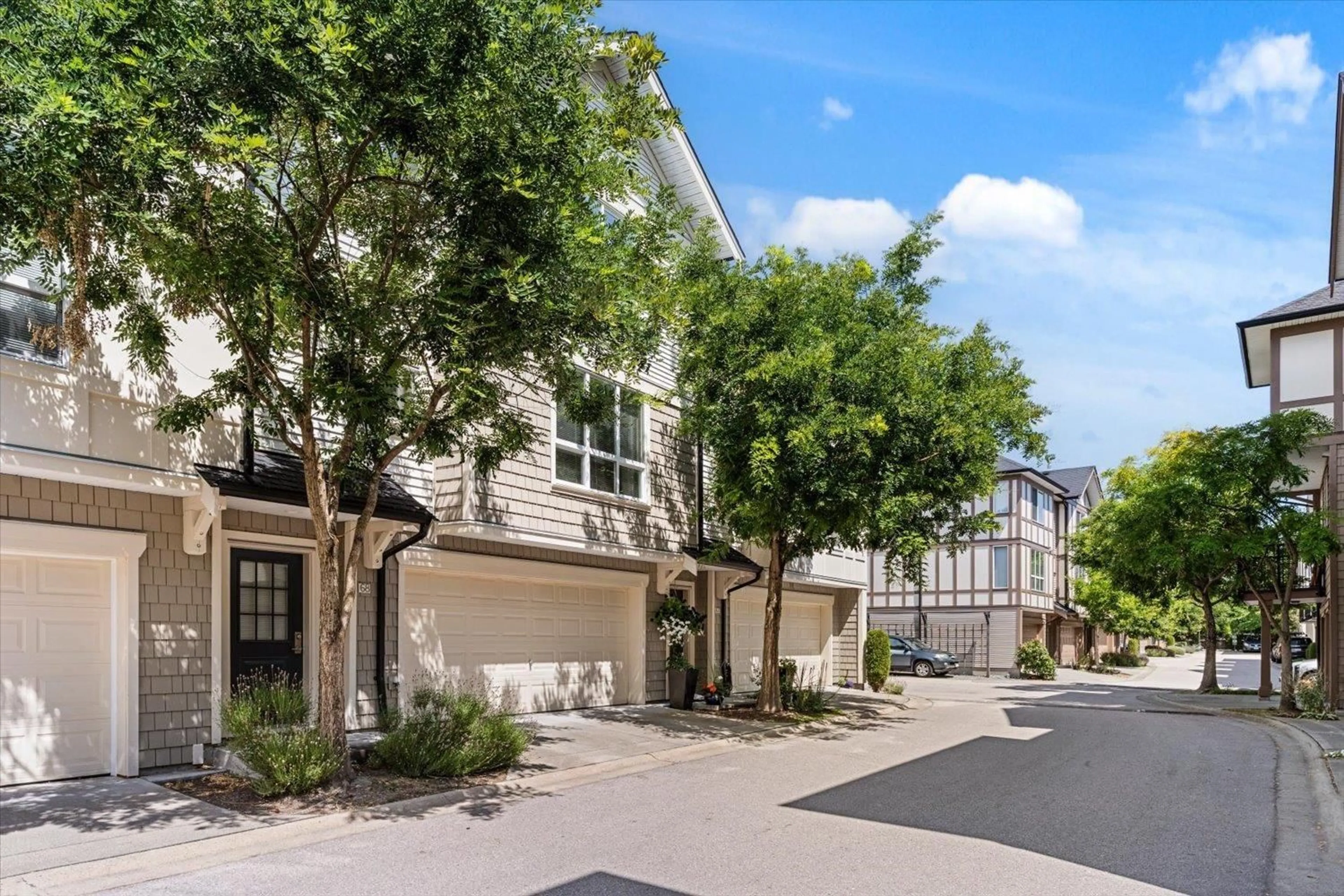 A pic from outside/outdoor area/front of a property/back of a property/a pic from drone, street for 68 - 7848 209 STREET, Langley British Columbia V2Y0M4