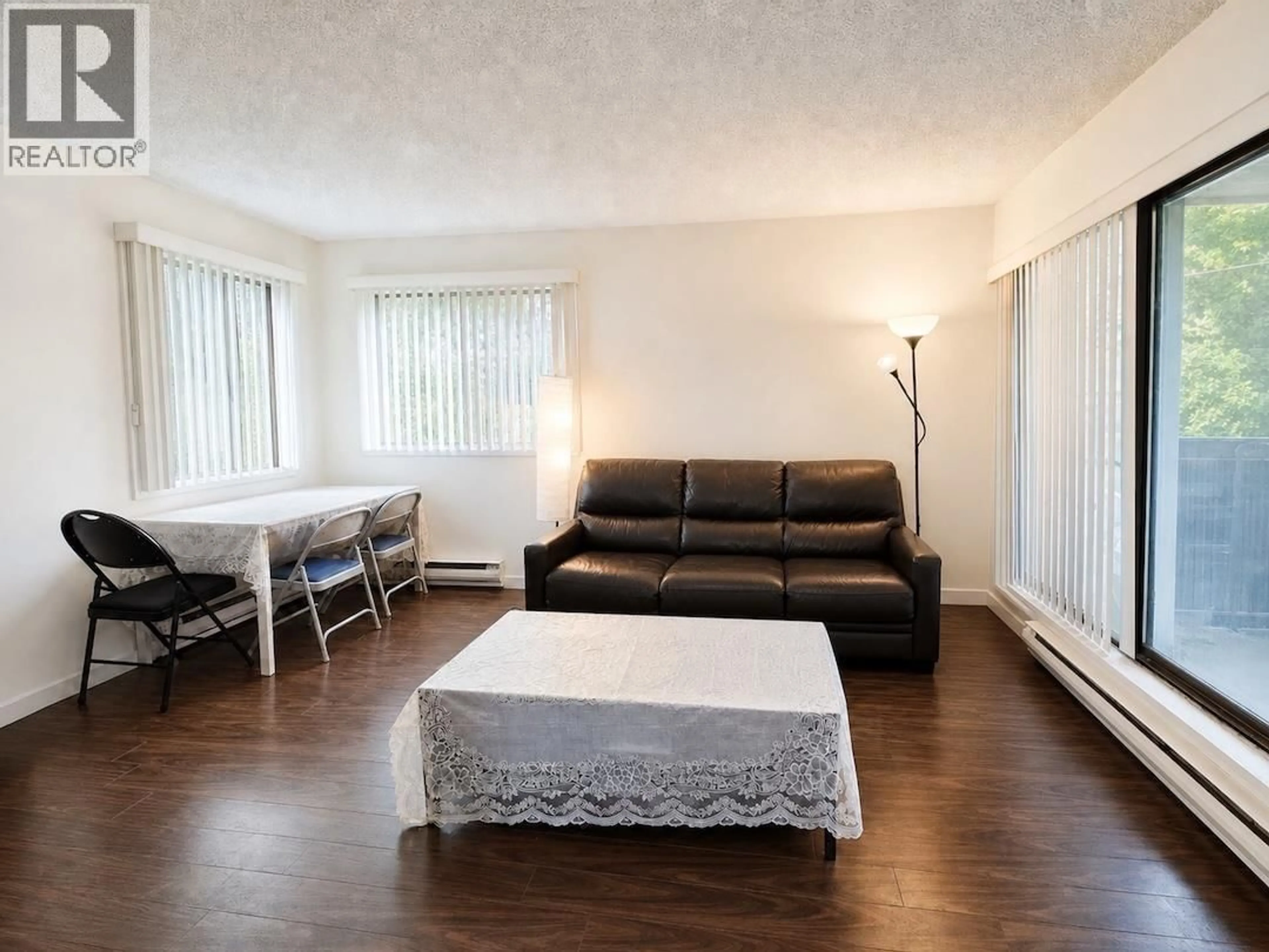 Living room with furniture, wood/laminate floor for 123 - 8700 ACKROYD ROAD, Richmond British Columbia V6X3G2