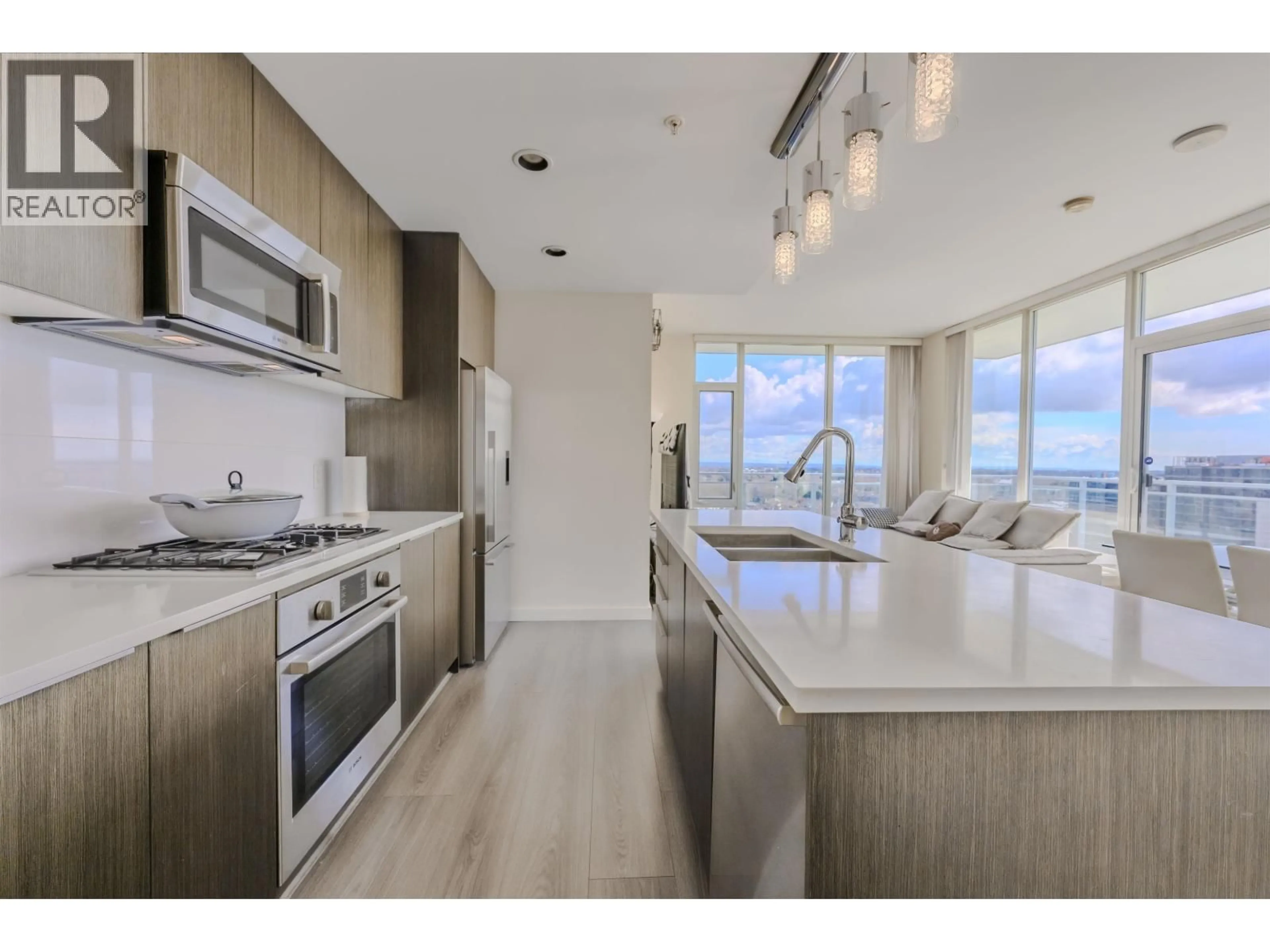 Open concept kitchen, unknown for 1705 - 8677 CAPSTAN WAY, Richmond British Columbia V6X0N6