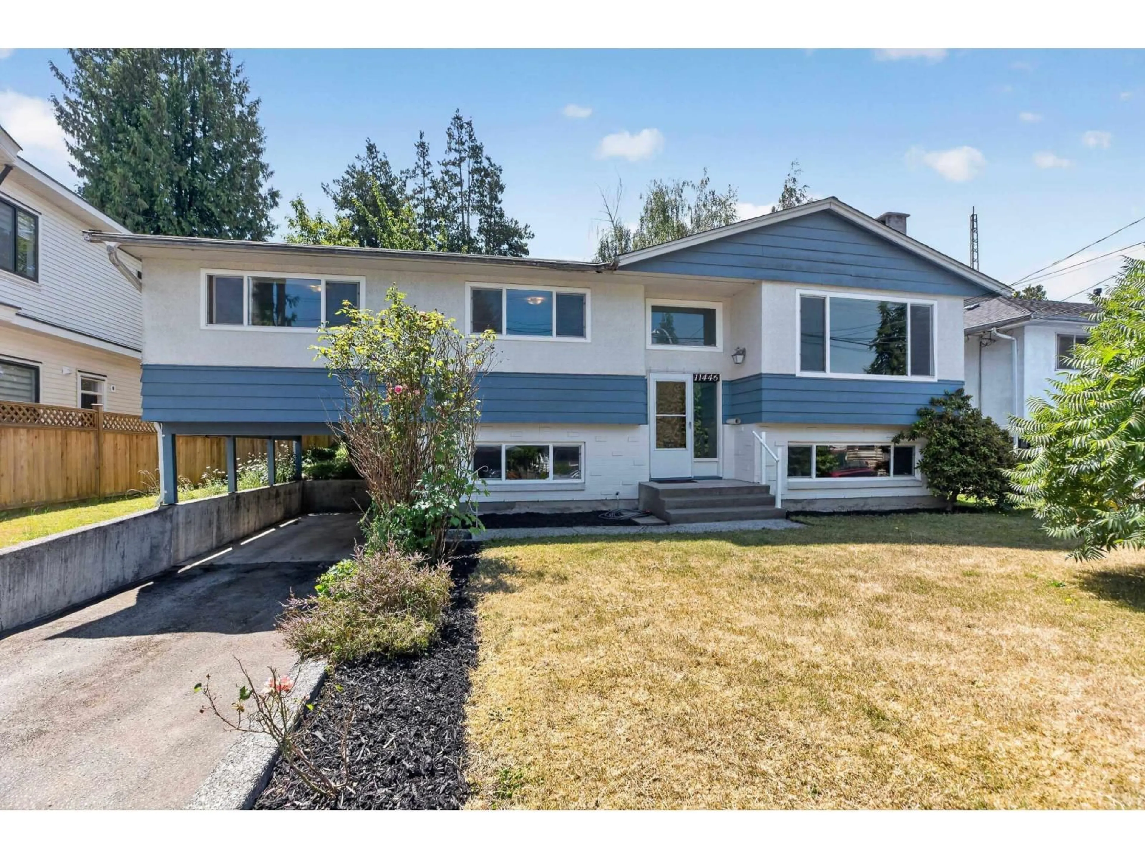 Home with vinyl exterior material, street for 11446 94 AVENUE, Delta British Columbia V4C3R2