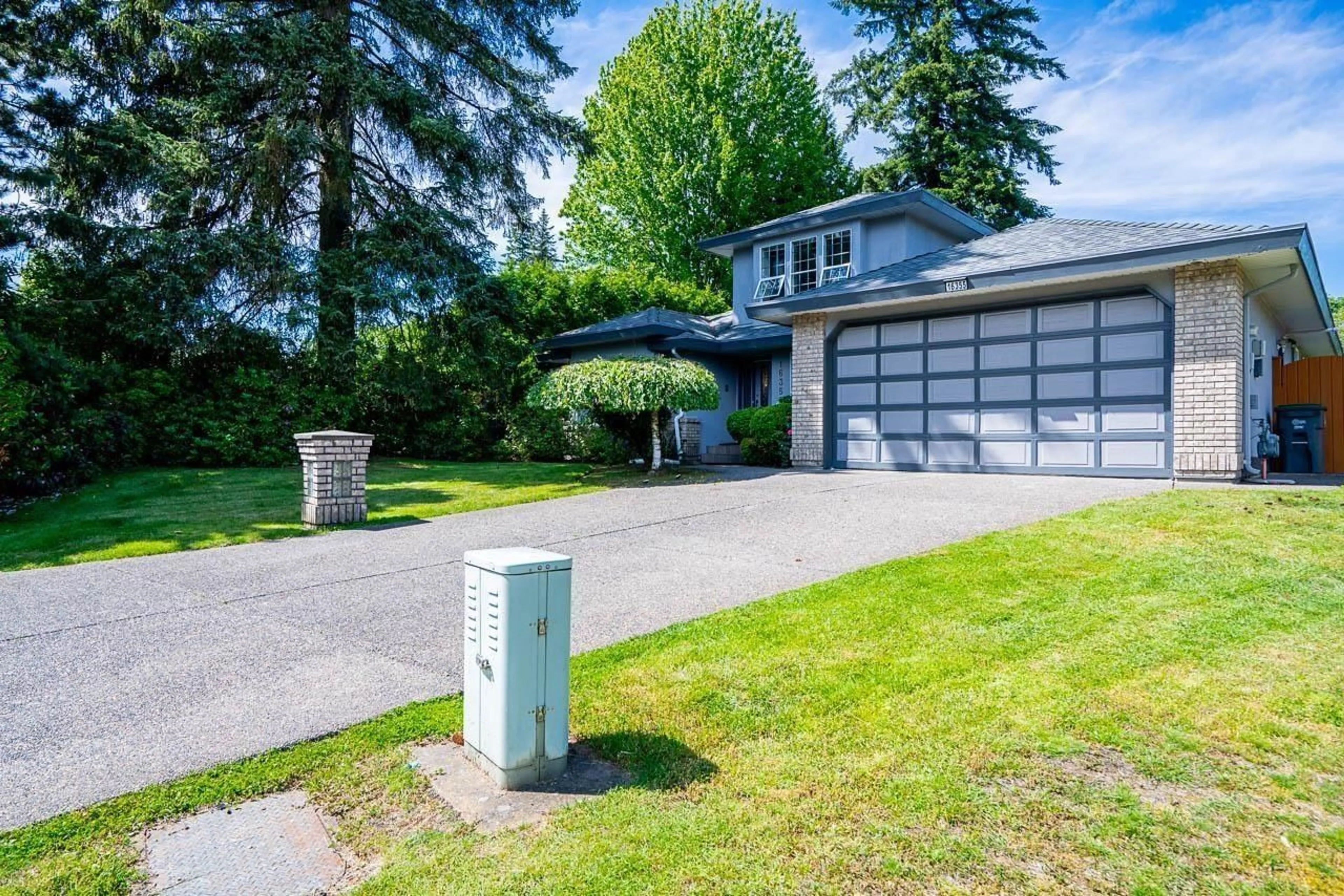 Home with vinyl exterior material, street for 16355 108A AVENUE, Surrey British Columbia V4N1N8