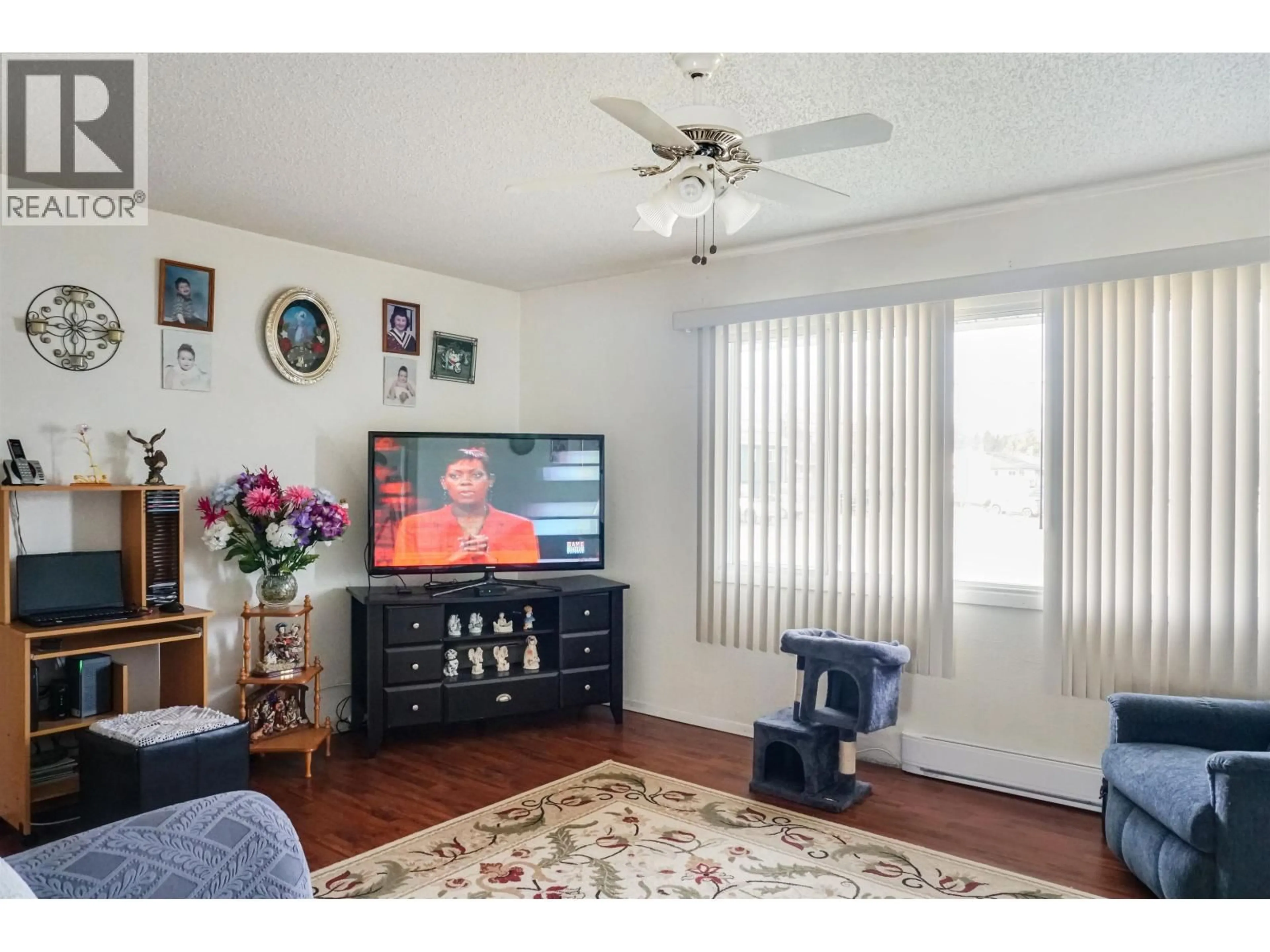 Living room with furniture, wood/laminate floor for 5 GREBE STREET, Kitimat British Columbia V8C1P2