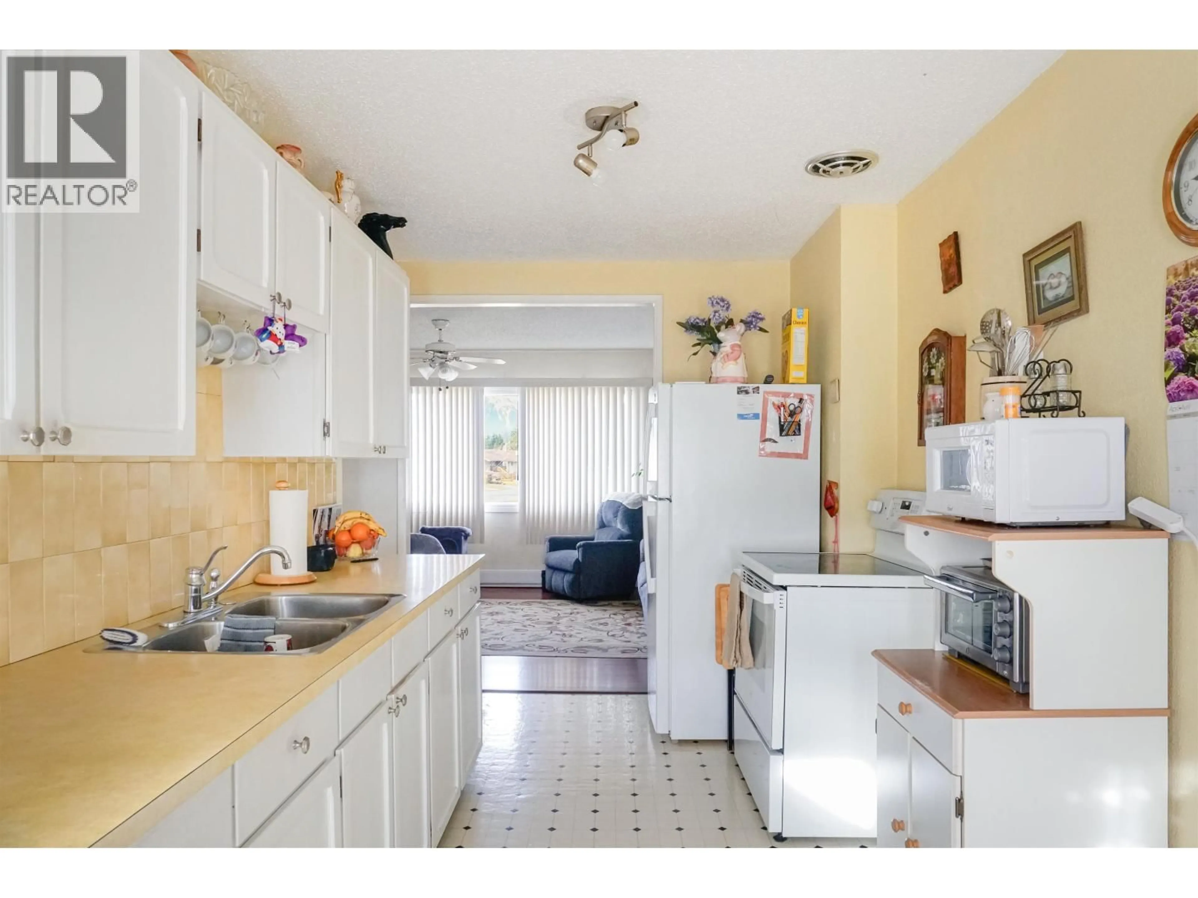 Standard kitchen, ceramic/tile floor for 5 GREBE STREET, Kitimat British Columbia V8C1P2