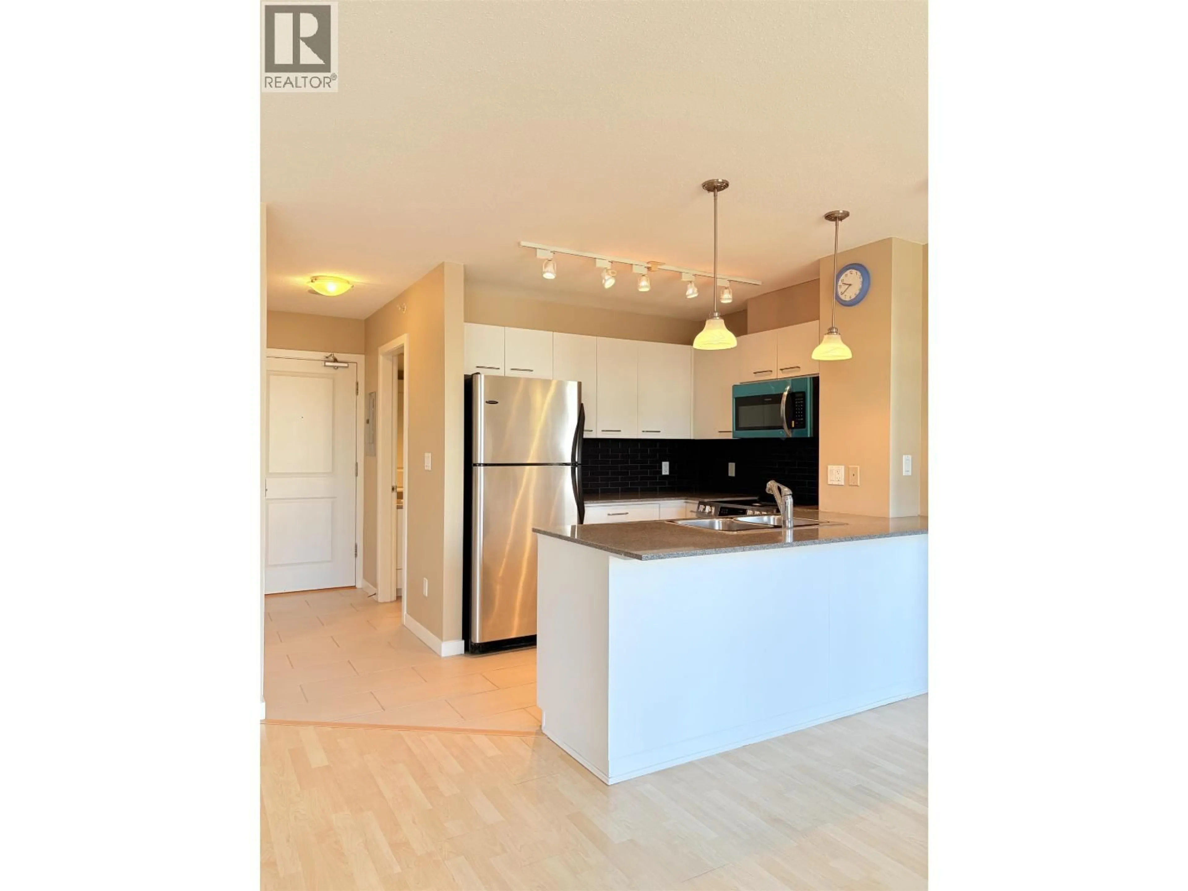 Open concept kitchen, wood/laminate floor for 602 - 4333 CENTRAL BOULEVARD, Burnaby British Columbia V5H4W8