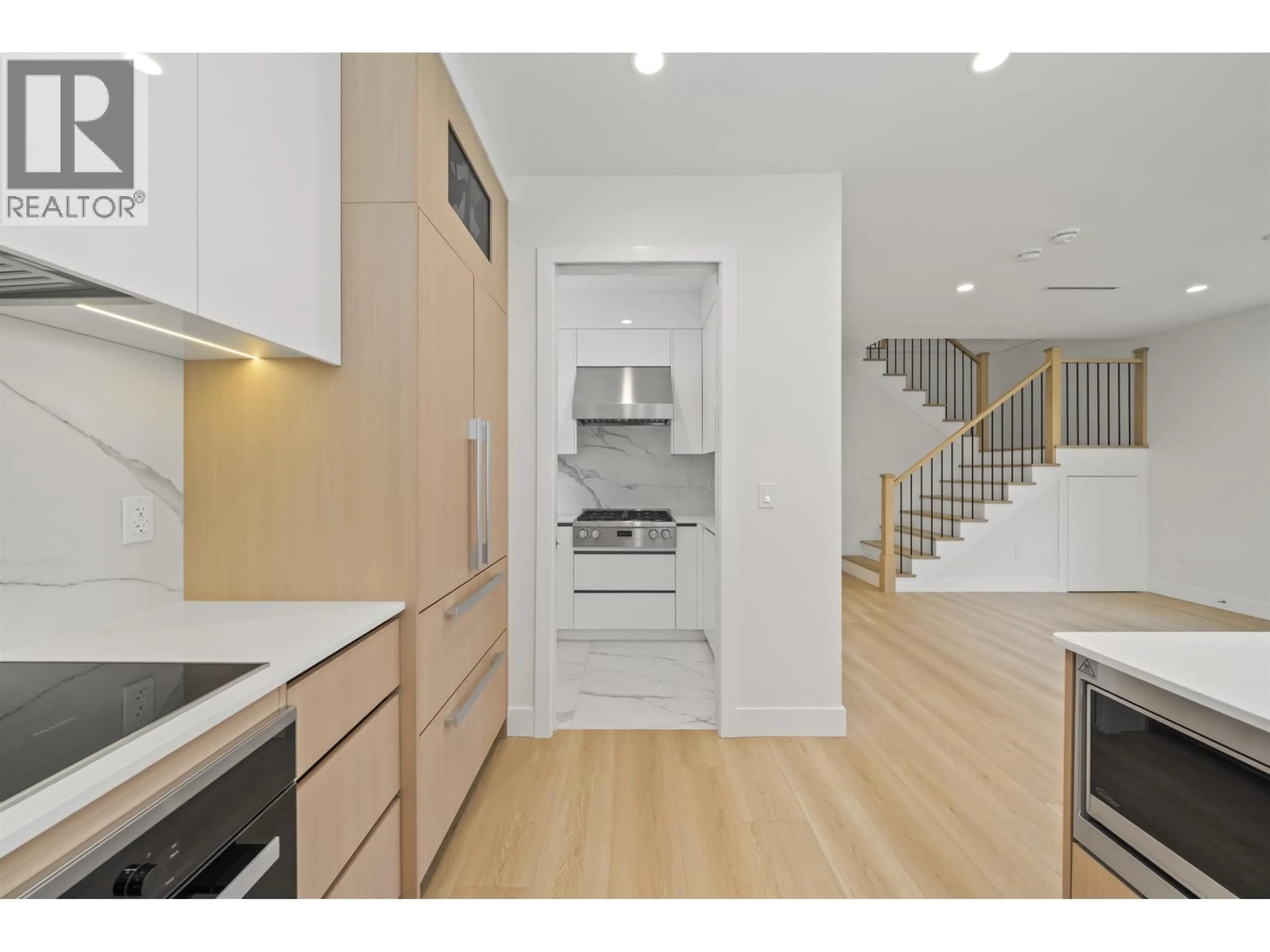 Open concept kitchen, wood/laminate floor for 6726 FRANCIS ROAD, Richmond British Columbia V7C1K5
