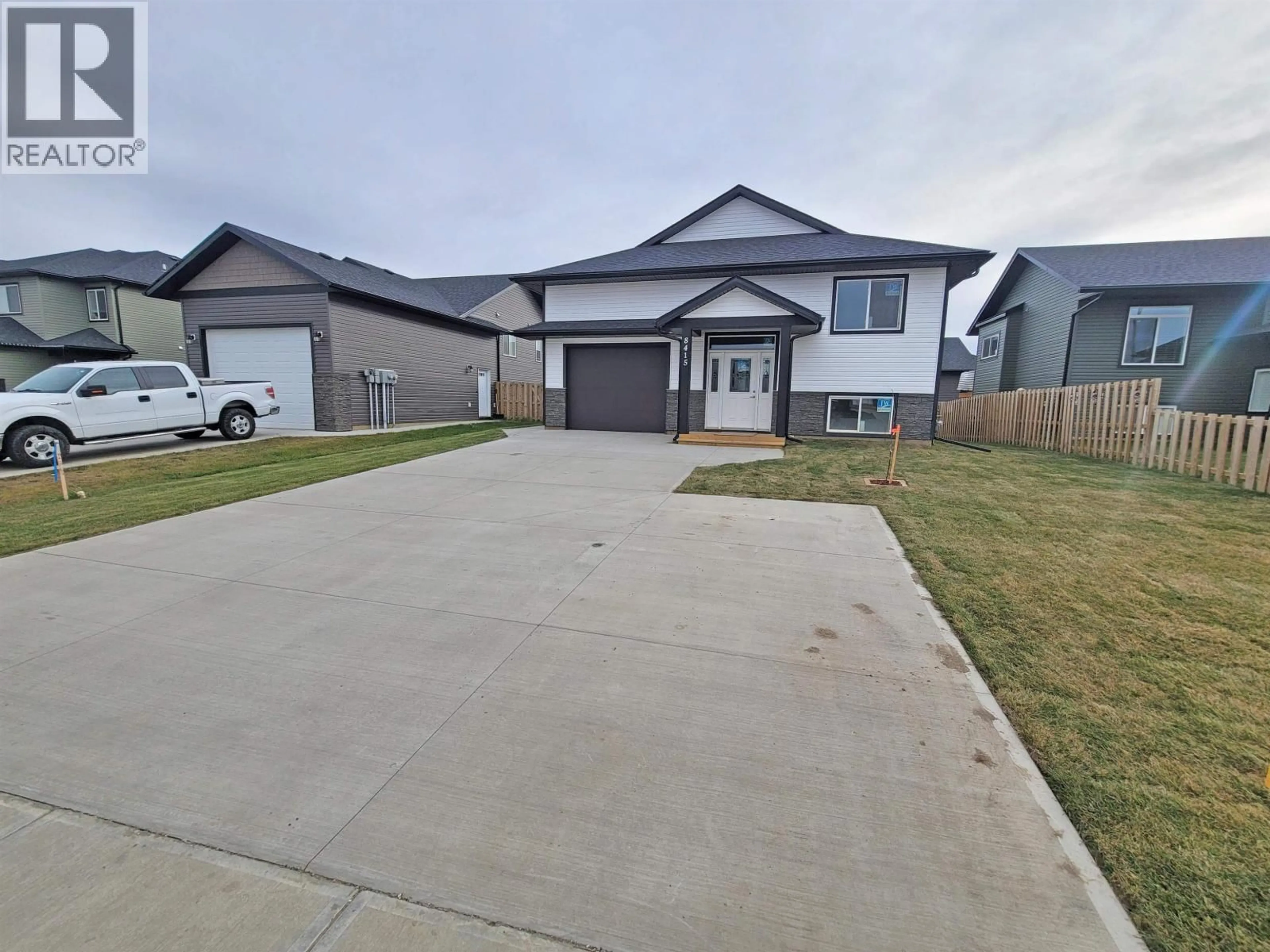 A pic from outside/outdoor area/front of a property/back of a property/a pic from drone, street for 8420 88 AVENUE, Fort St. John British Columbia V1J0P4