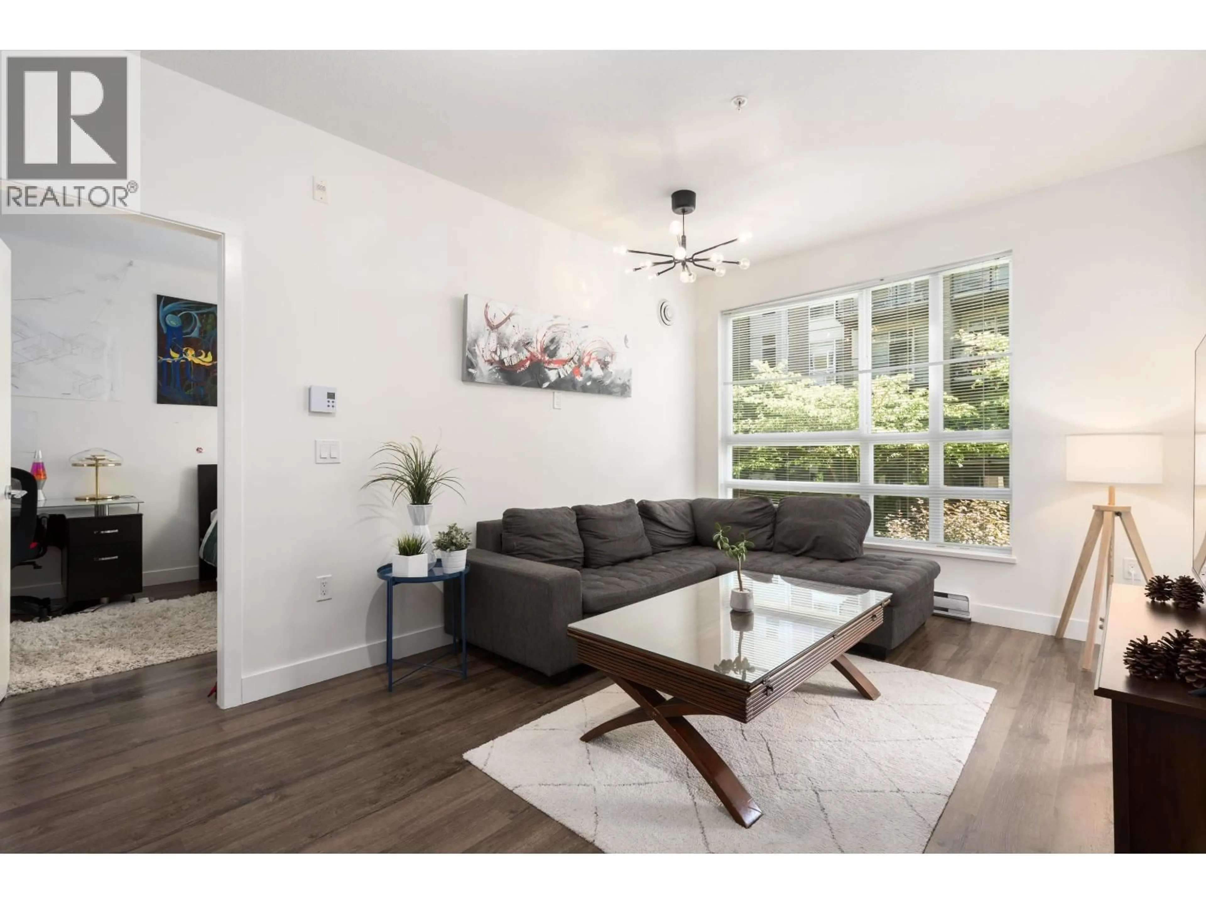 Living room with furniture, wood/laminate floor for 217 - 6033 GRAY AVENUE, Vancouver British Columbia V6S0G3