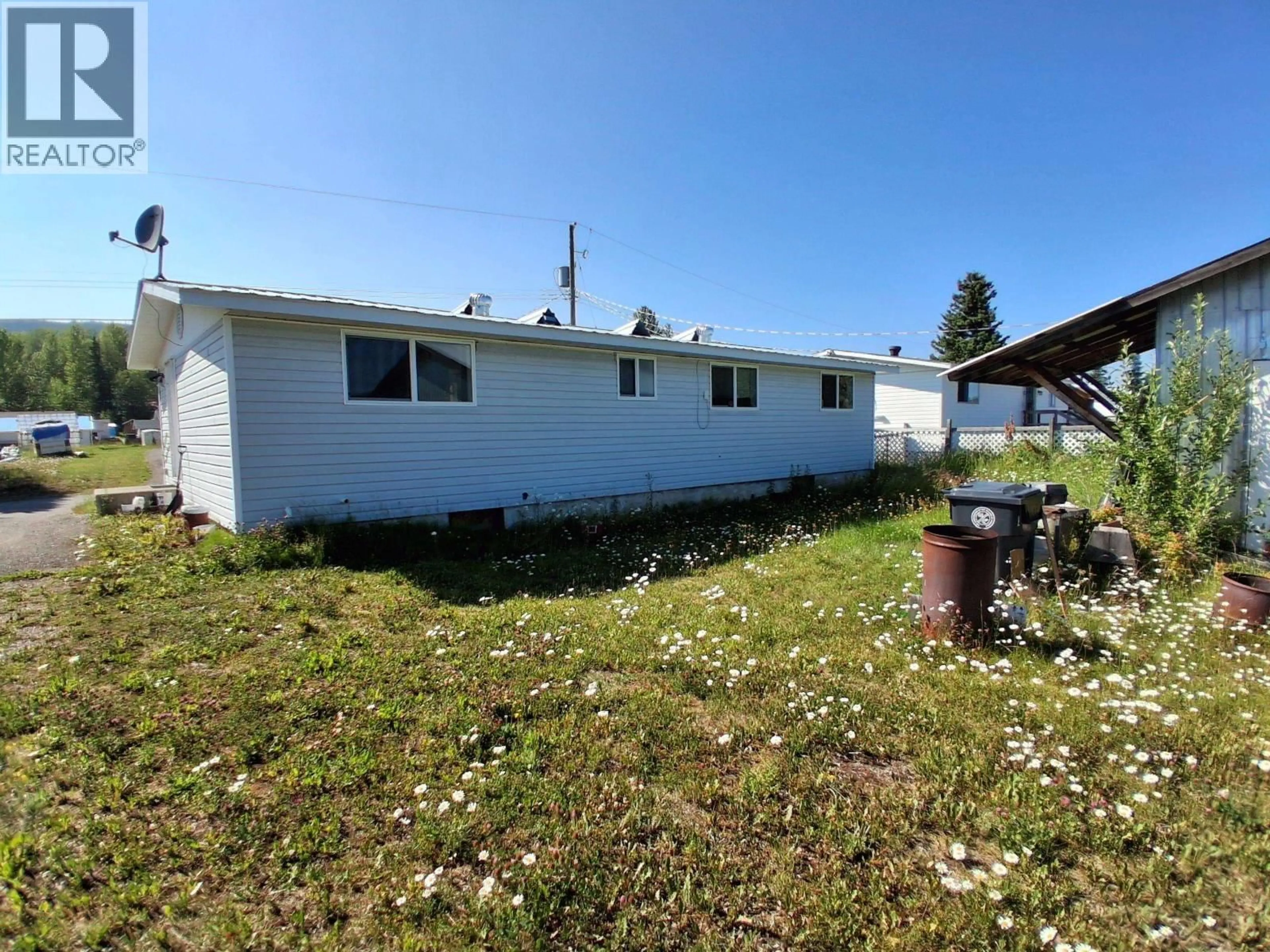 A pic from outside/outdoor area/front of a property/back of a property/a pic from drone, street for 47 MORRISON STREET, Granisle British Columbia V0J1W0