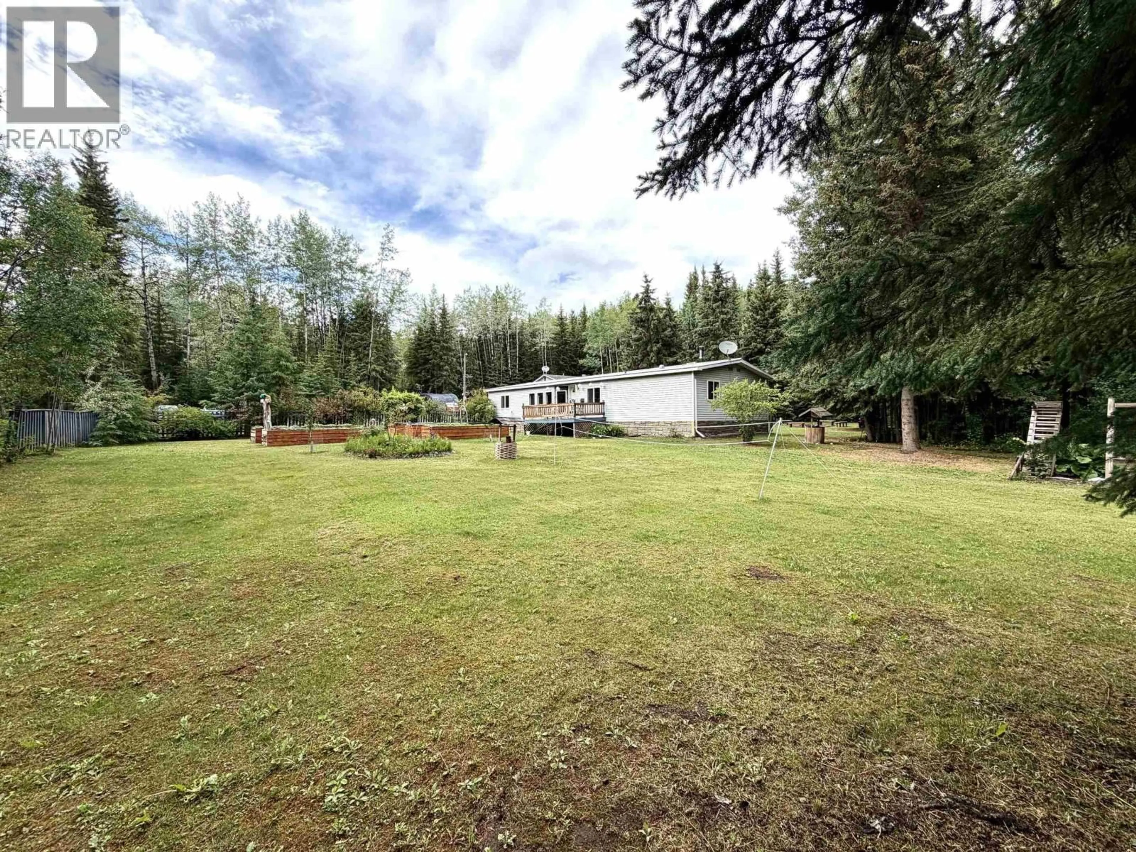A pic from outside/outdoor area/front of a property/back of a property/a pic from drone, forest/trees view for 4004 WILLIAMS CRESCENT, Houston British Columbia V0J1Z2