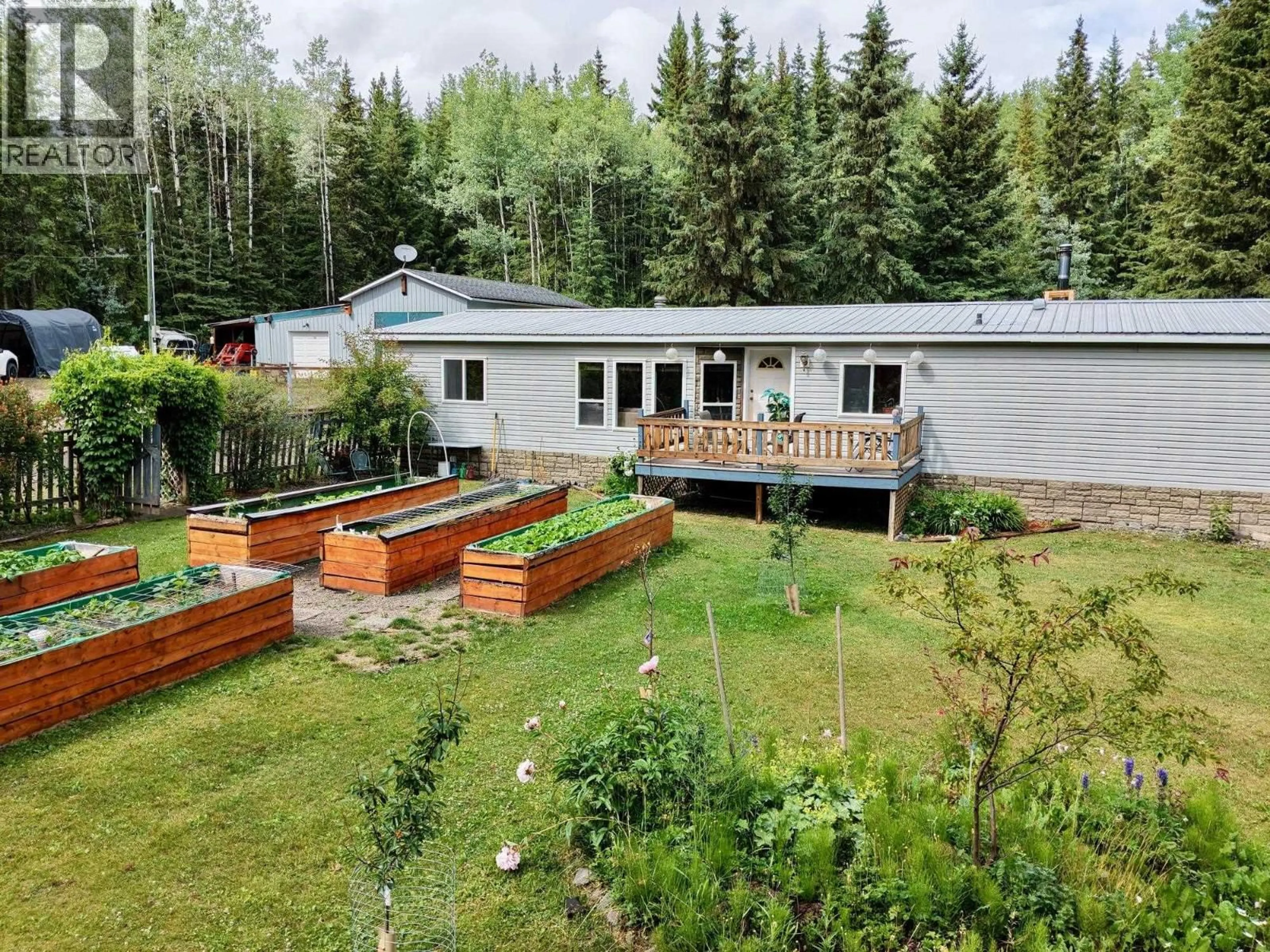 A pic from outside/outdoor area/front of a property/back of a property/a pic from drone, forest/trees view for 4004 WILLIAMS CRESCENT, Houston British Columbia V0J1Z2