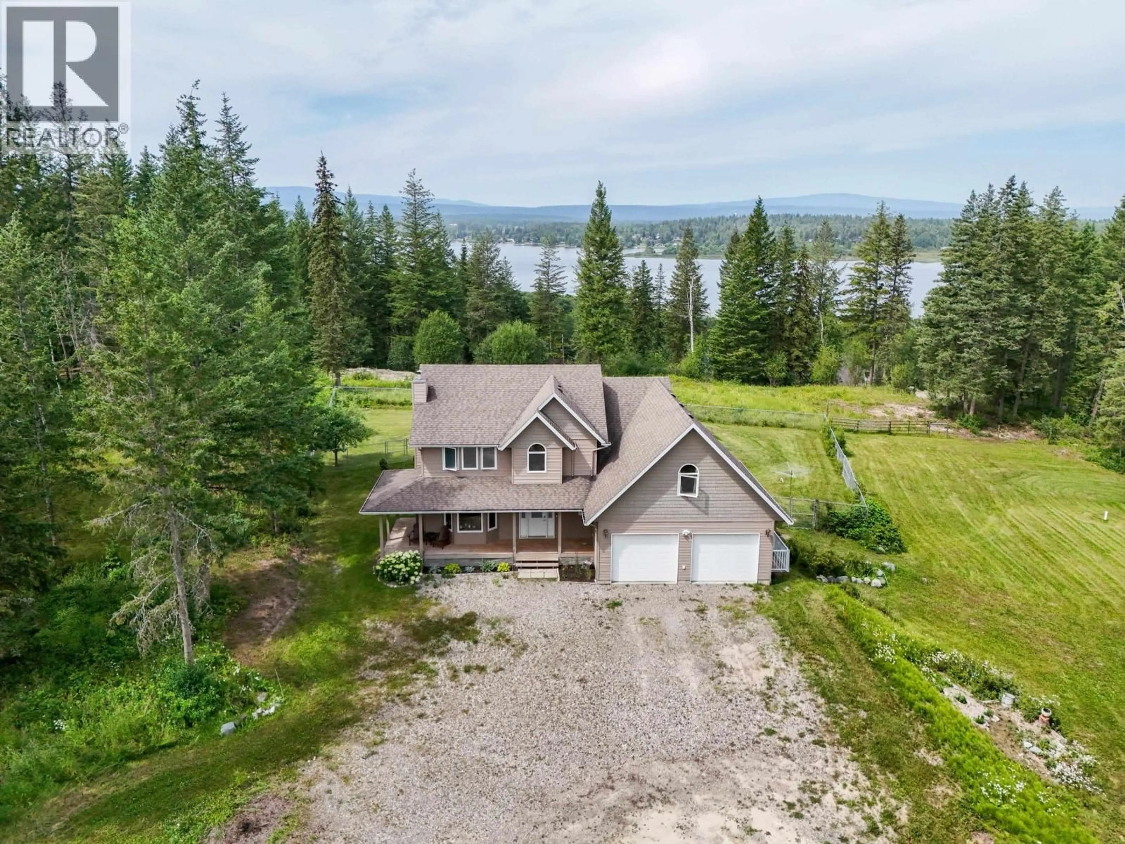 A pic from outside/outdoor area/front of a property/back of a property/a pic from drone, water/lake/river/ocean view for 1551 VIEW DRIVE, Quesnel British Columbia V2J6G1