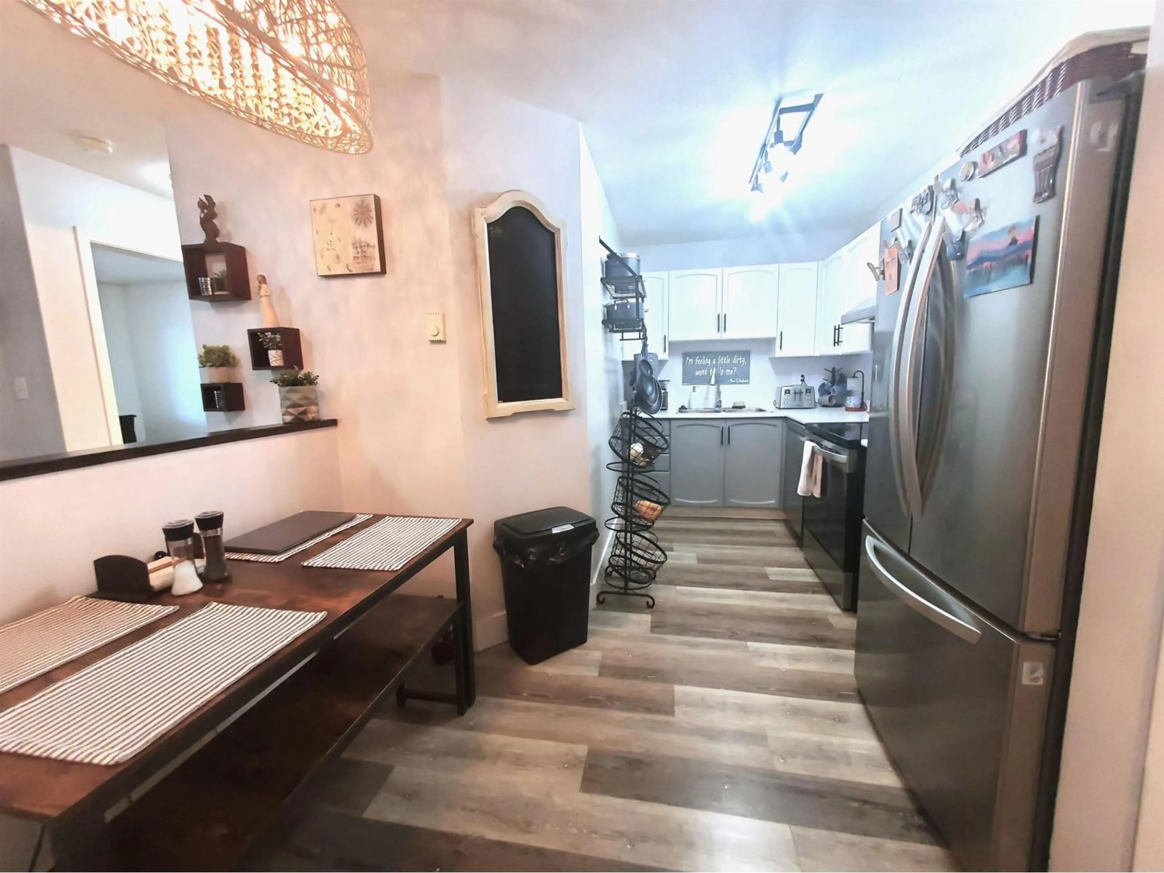 Open concept kitchen, ceramic/tile floor for 208 - 2964 TRETHEWEY STREET, Abbotsford British Columbia V2T6P4