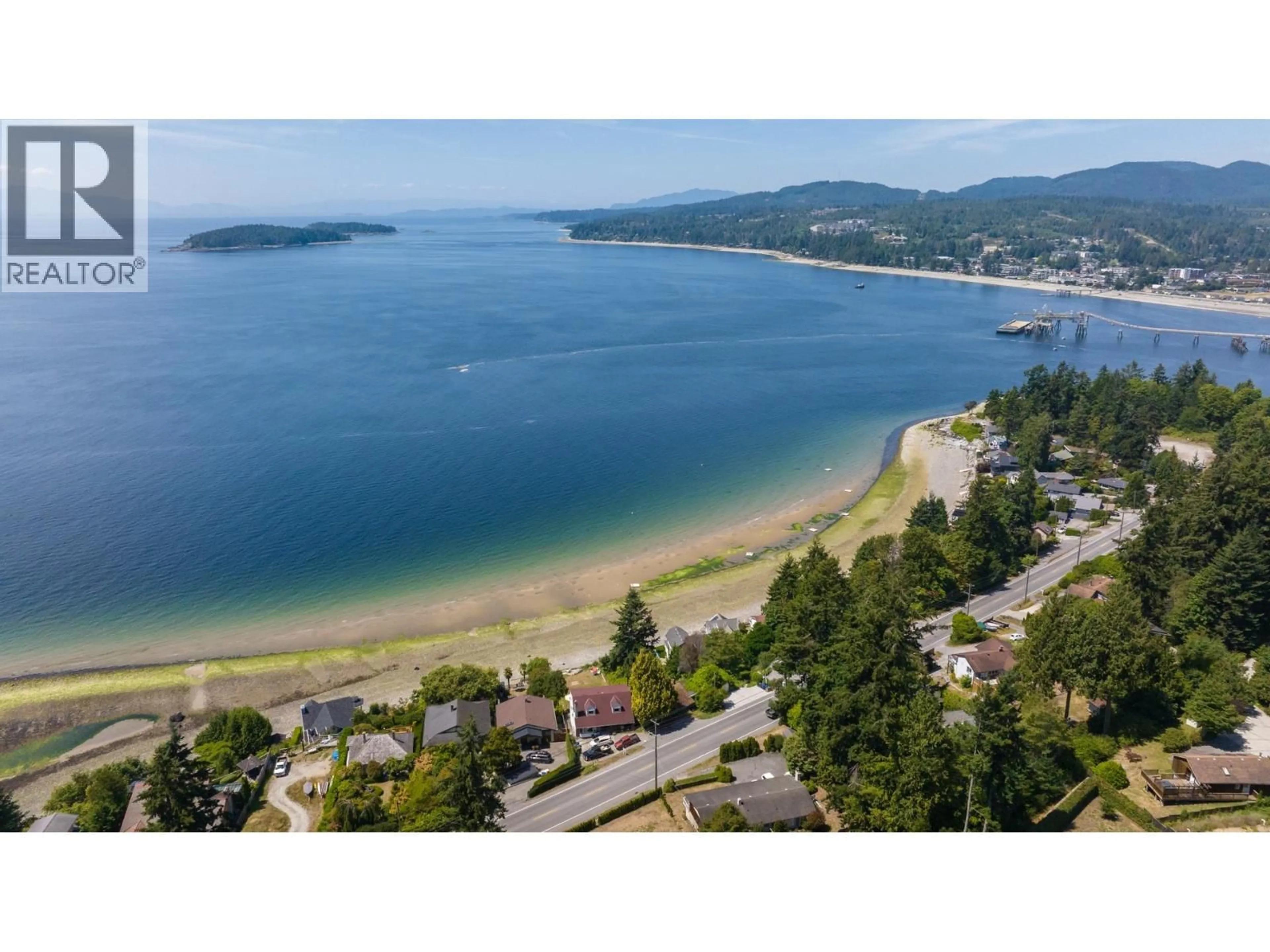 A pic from outside/outdoor area/front of a property/back of a property/a pic from drone, water/lake/river/ocean view for 5223 SUNSHINE COAST HIGHWAY, Sechelt British Columbia V7Z0C4