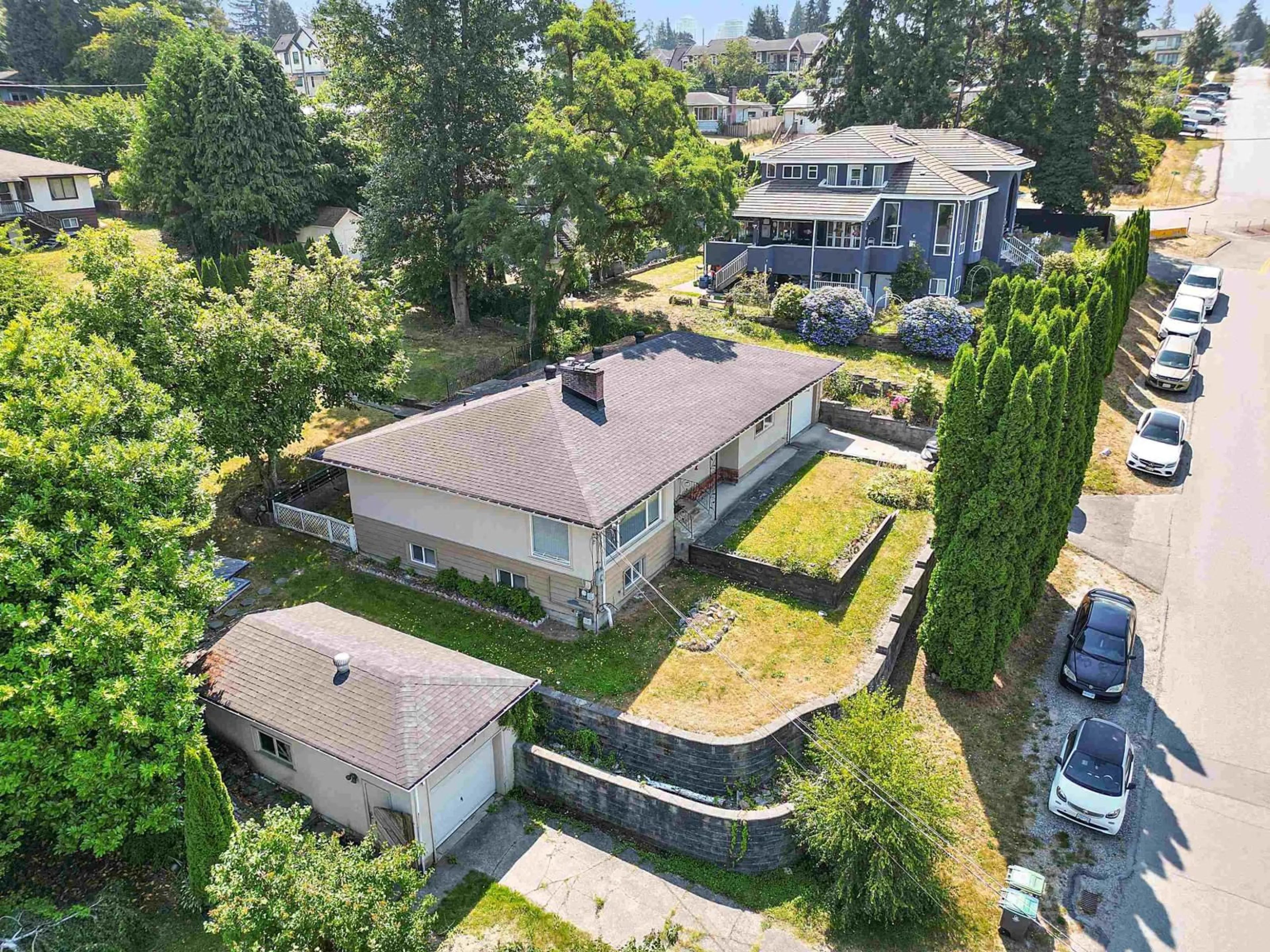 A pic from outside/outdoor area/front of a property/back of a property/a pic from drone, unknown for 11028 129A STREET, Surrey British Columbia V3T3L1