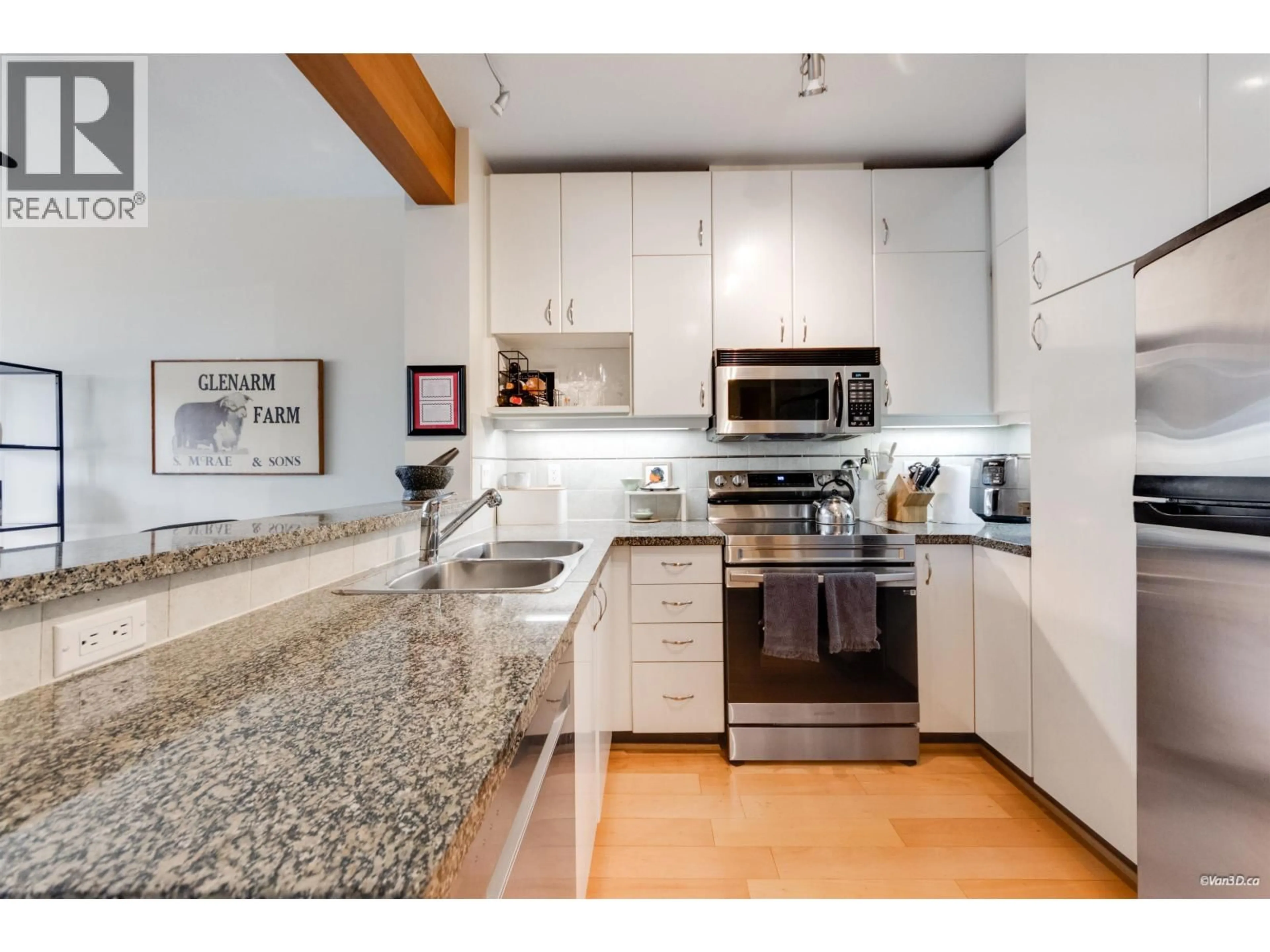 Open concept kitchen, unknown for 319 - 580 RAVEN WOODS DRIVE, North Vancouver British Columbia V7G2T2