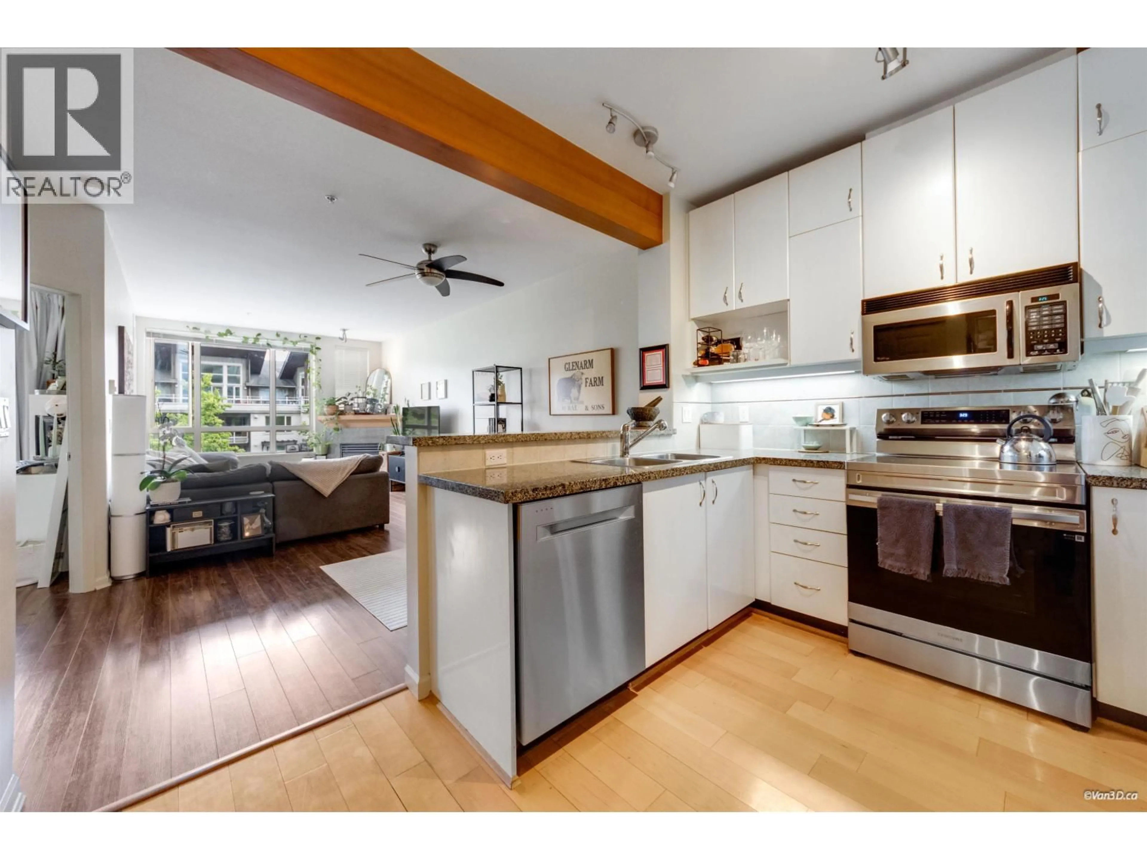 Open concept kitchen, unknown for 319 - 580 RAVEN WOODS DRIVE, North Vancouver British Columbia V7G2T2