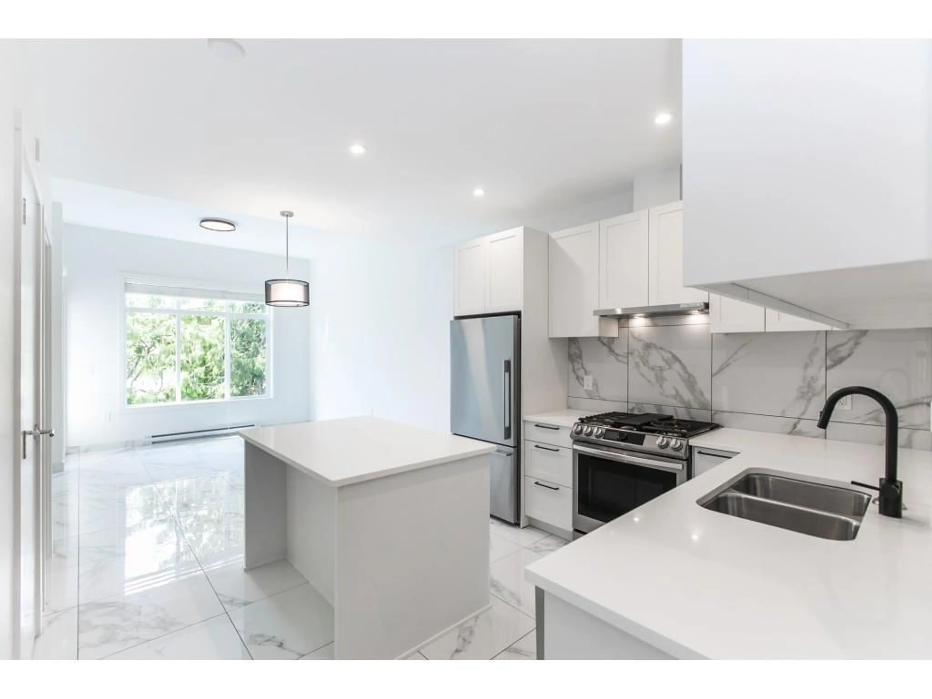 Open concept kitchen, ceramic/tile floor for 109 - 5415 BRYDON CRESCENT, Langley British Columbia V3A4A3