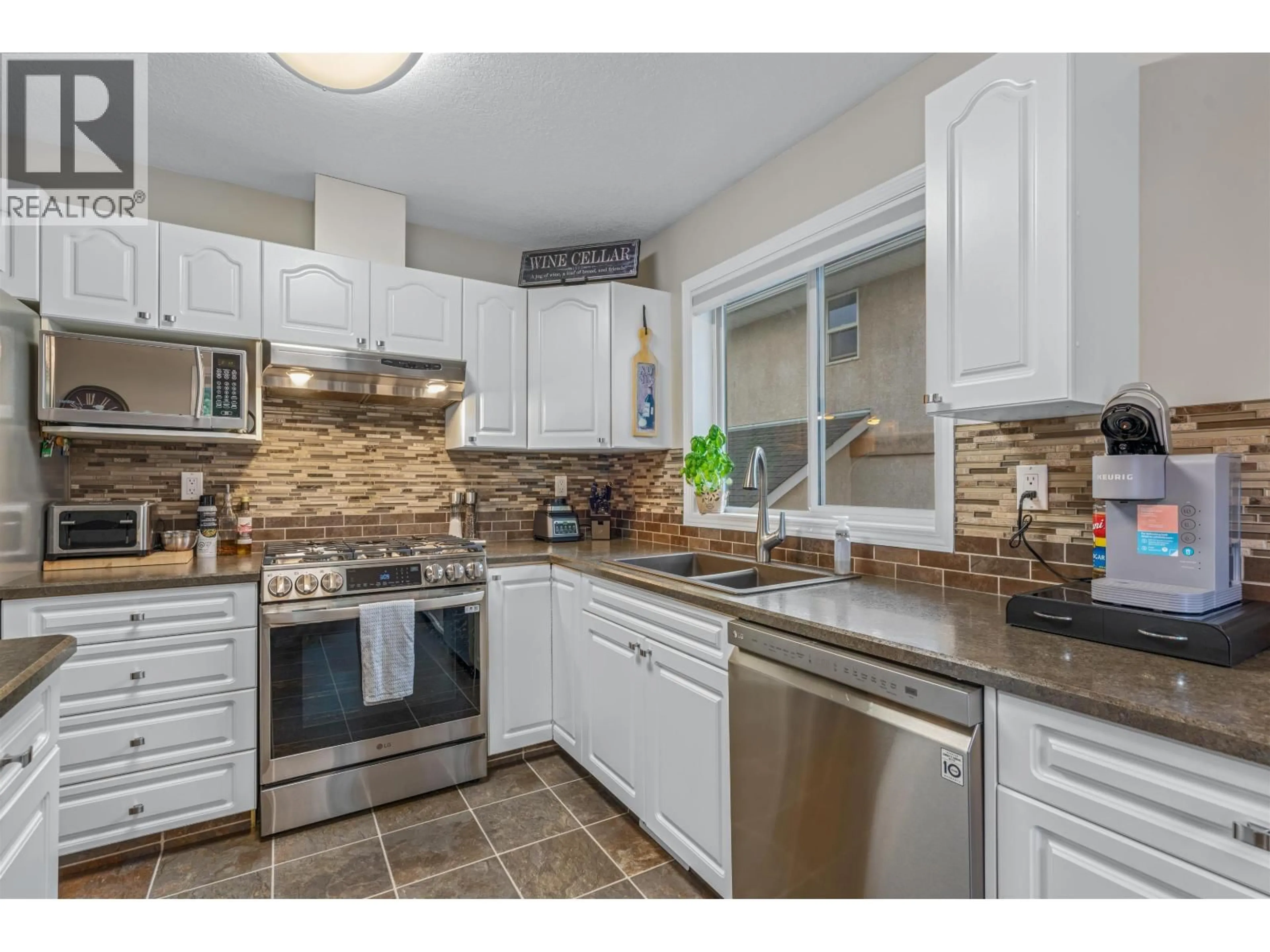 Open concept kitchen, ceramic/tile floor for 3110 VISTA VIEW ROAD, Prince George British Columbia V2N6R7